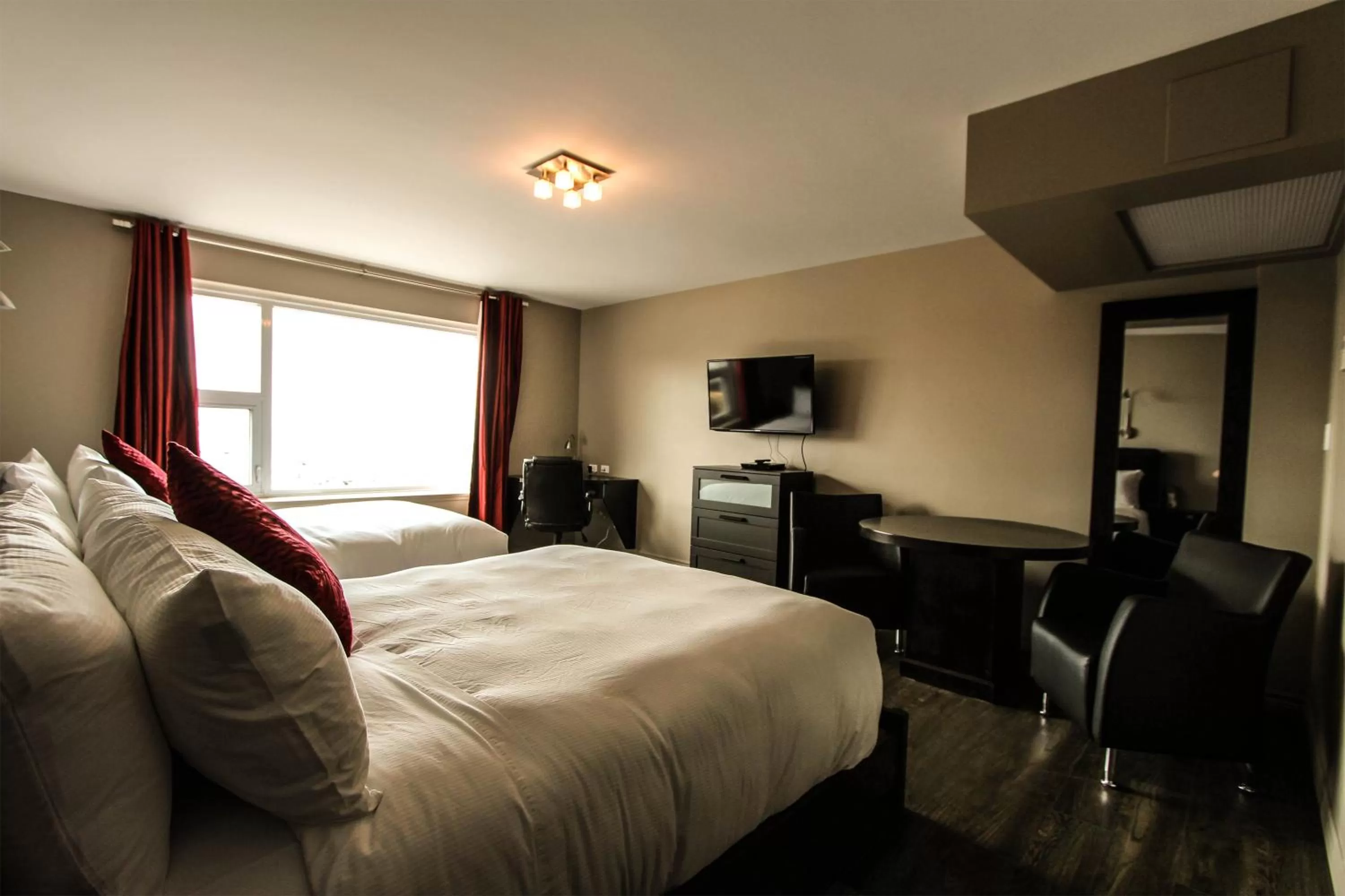 Bed in Hôtel Saint-Germain Rimouski