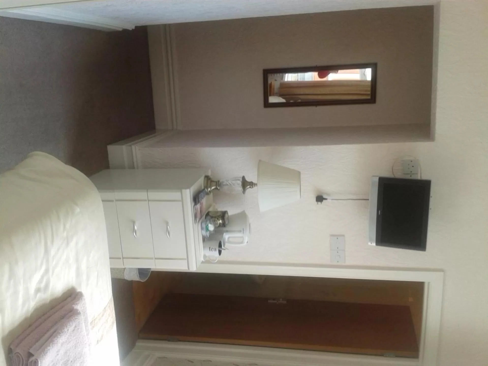 Day, TV/Entertainment Center in Legends Hotel