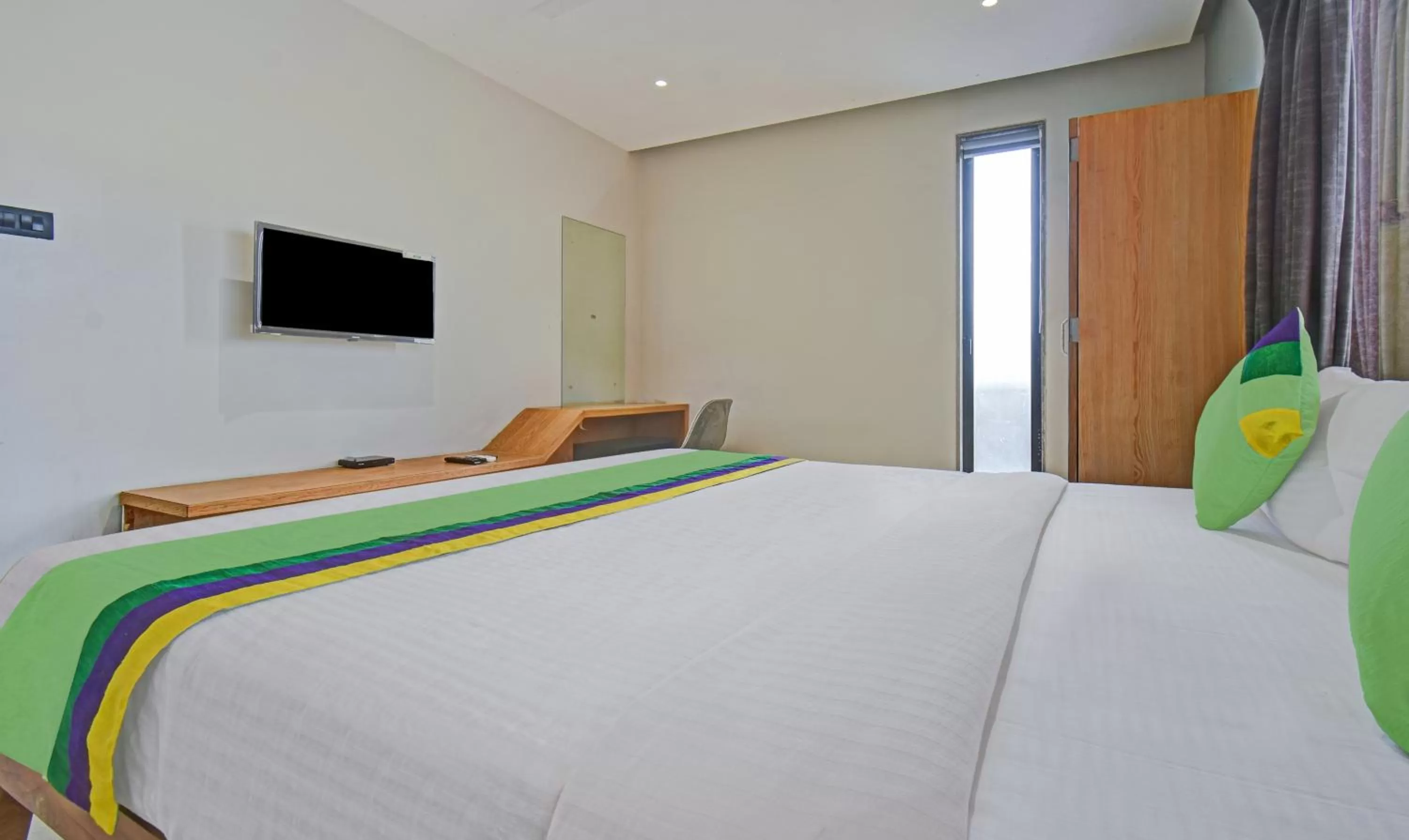 Bedroom, Bed in Treebo Aroma Executive