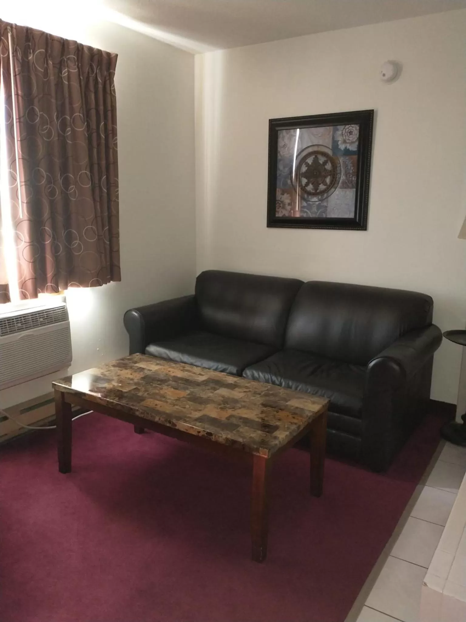 Seating area in Americas Best Value Inn Sauk Centre