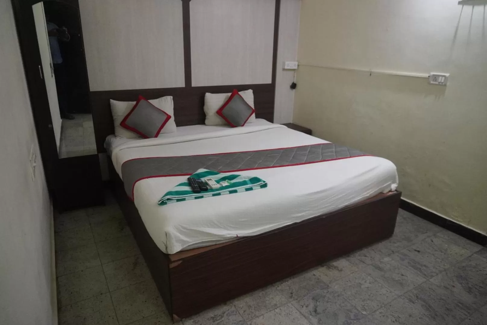 Photo of the whole room, Bed in The Dolphin Park Hotel, Virugambakkam