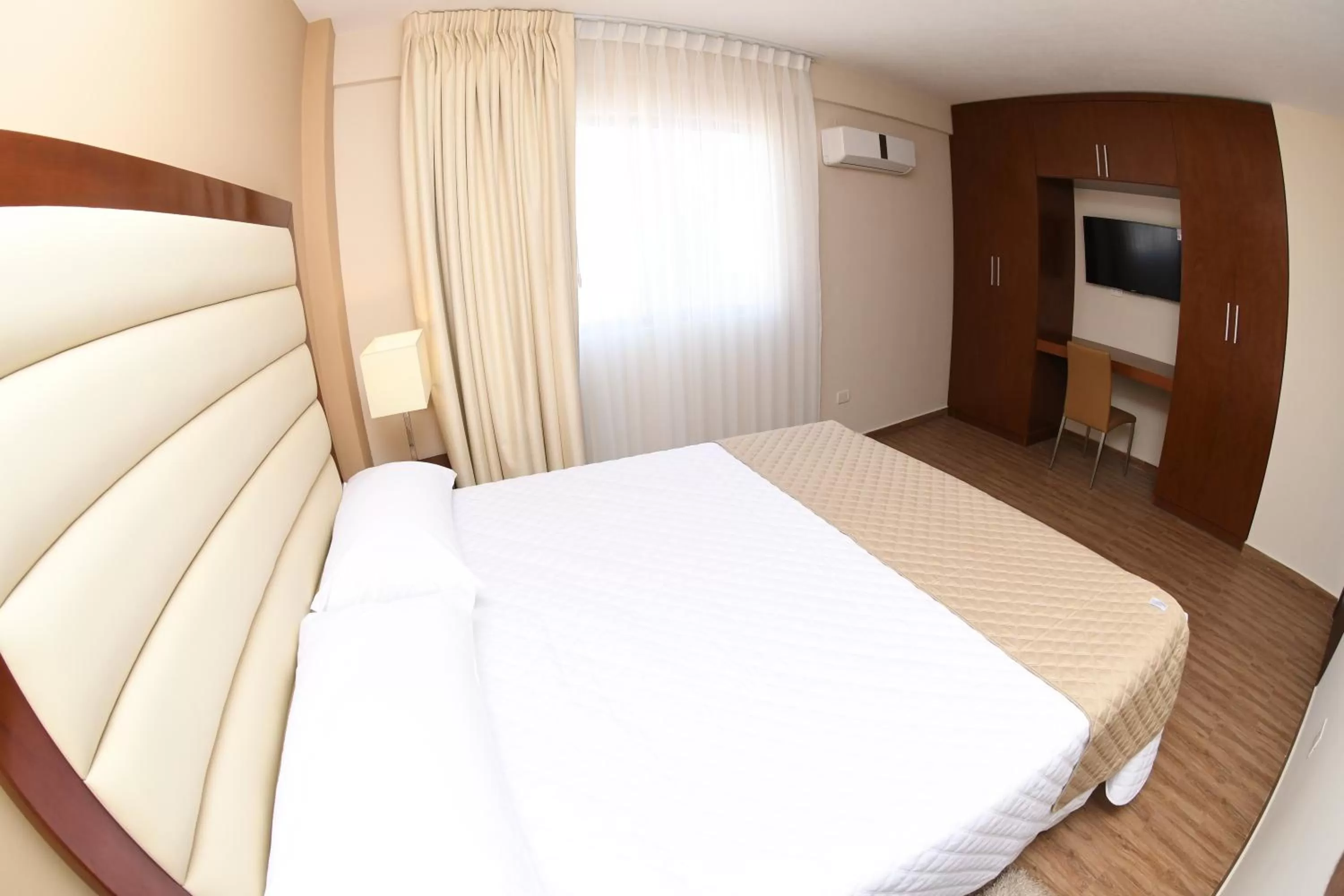 Bed in Taos Apart Hotel