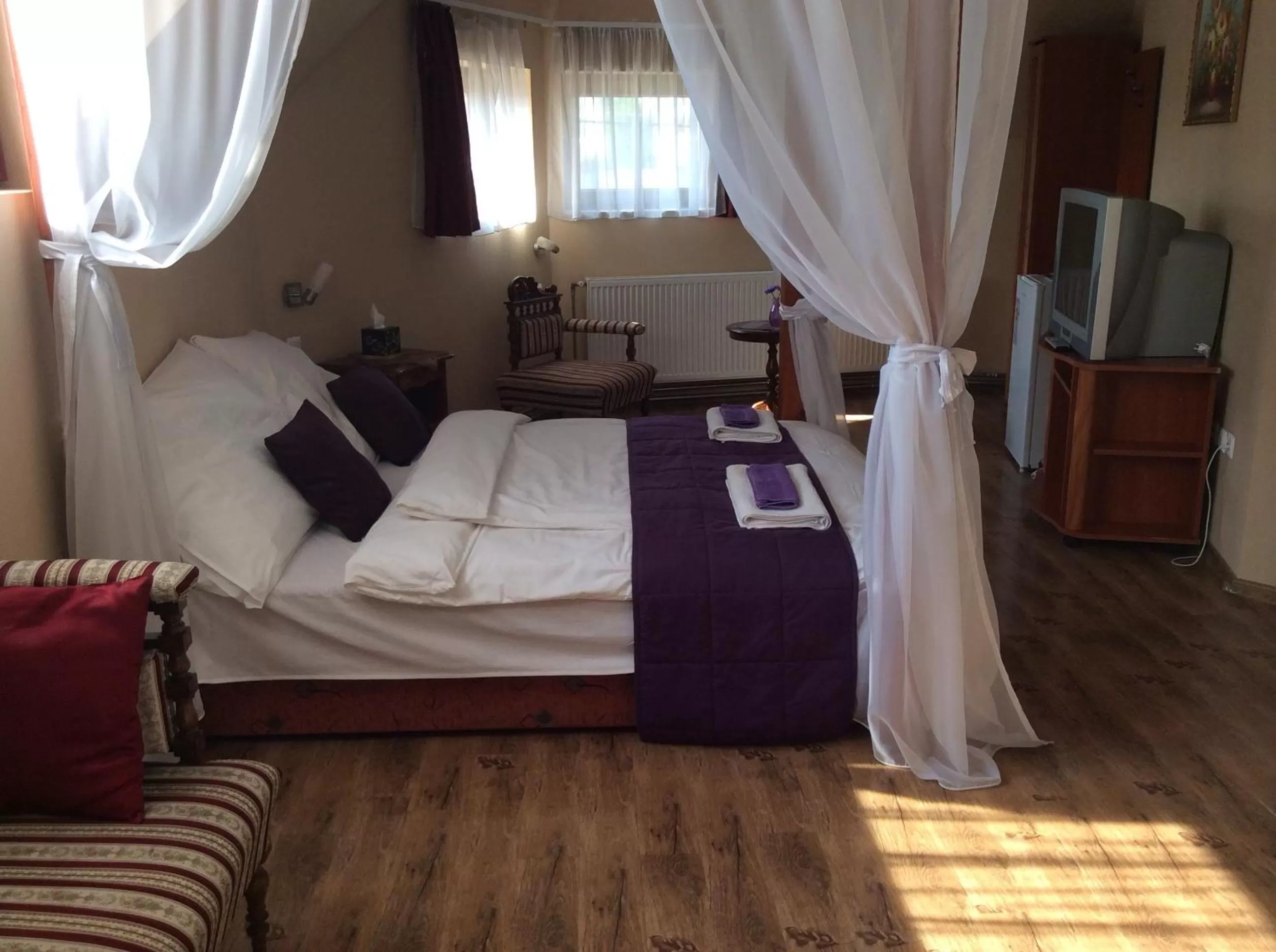 Bed in Abszolút Hotel és Panzió