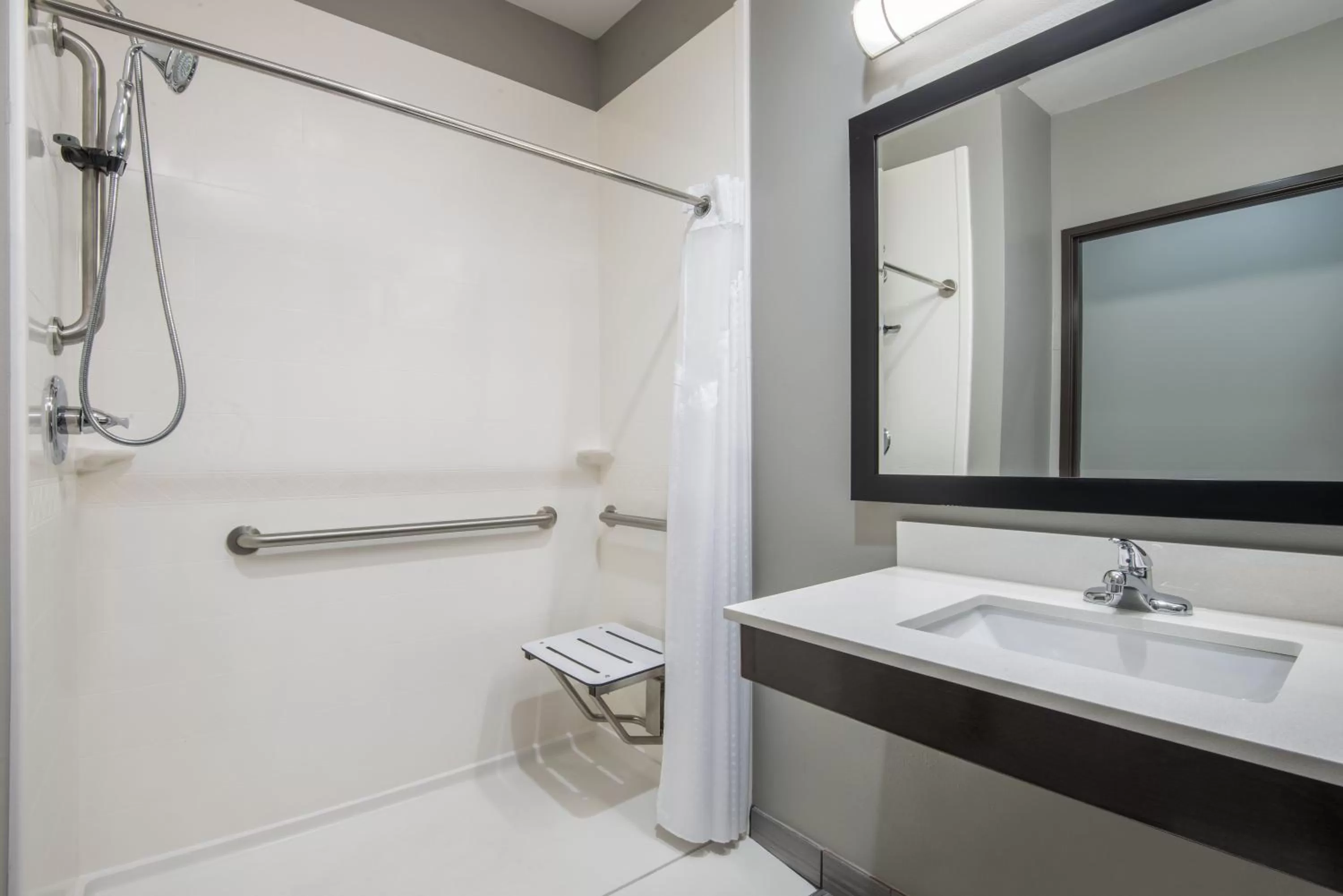Bathroom in Holiday Inn Express & Suites Stillwater - University Area by IHG