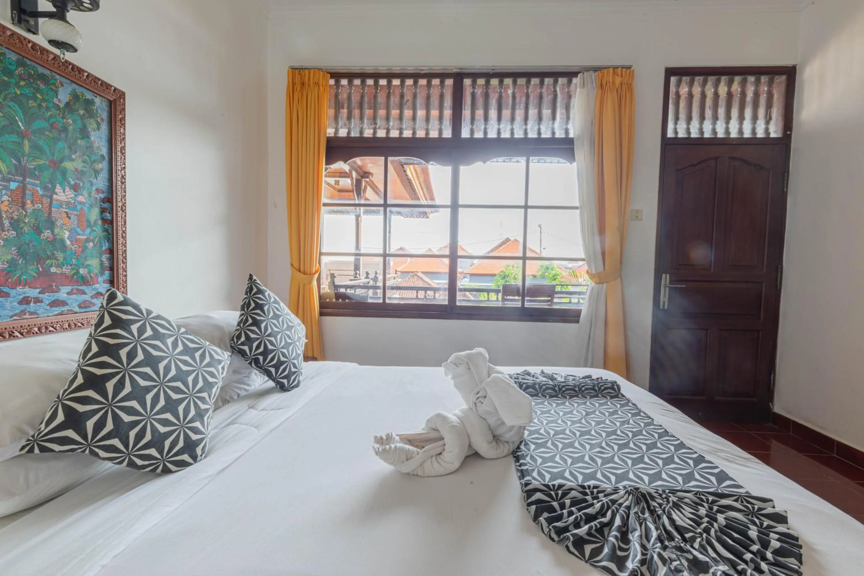 Bedroom in Puri Mango Guest House Sanur