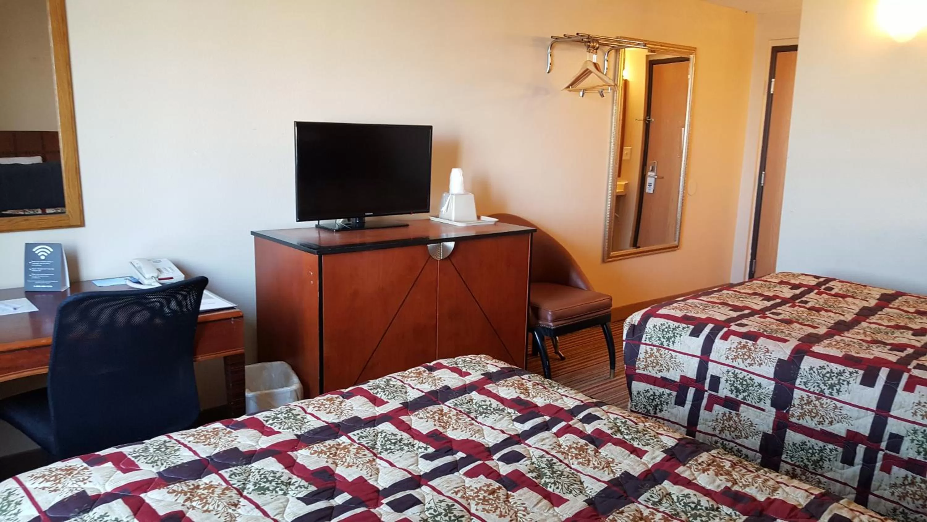 Bed in Knights Inn and Suites - Grand Forks