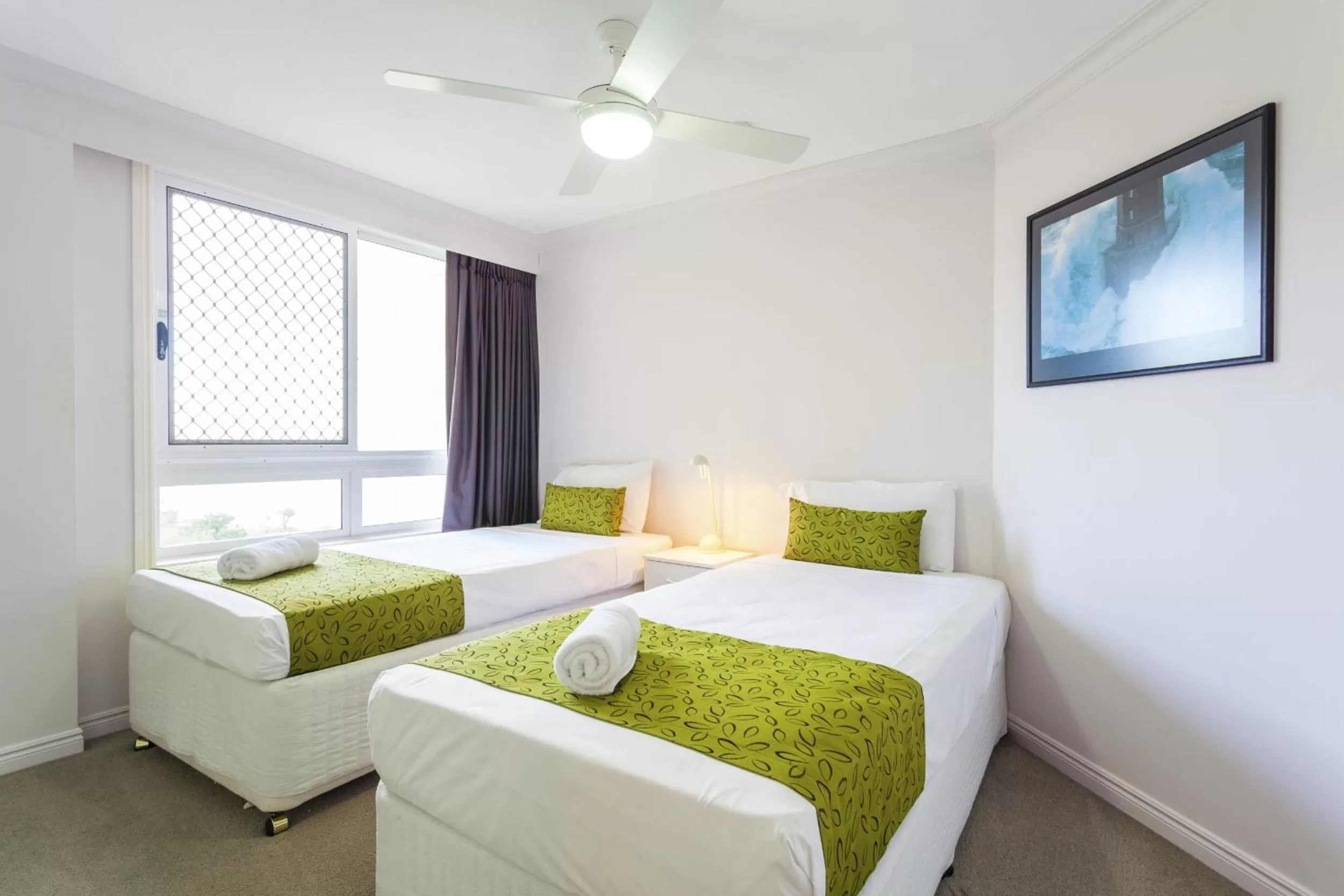 Bed in La Grande Apartments