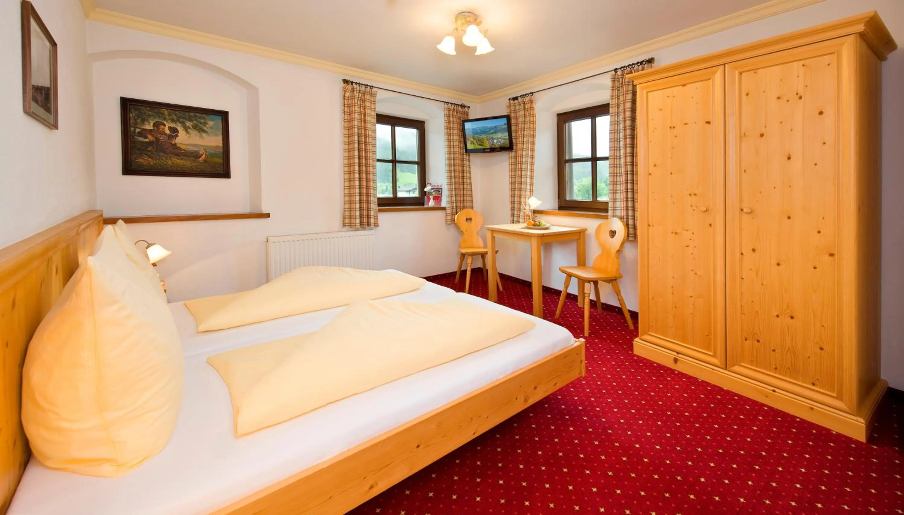 Photo of the whole room, Bed in Hotel Reitlwirt