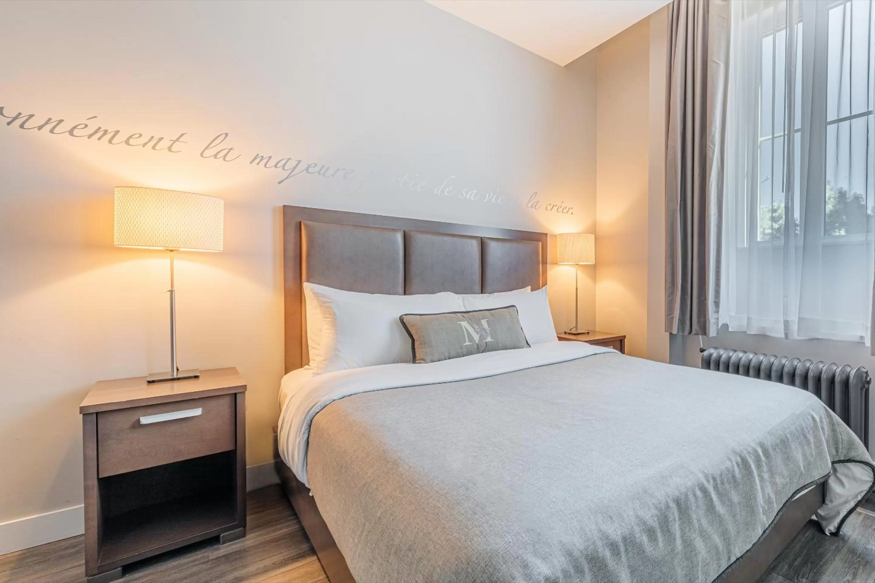 Bed in Hotel Montfort Nicolet