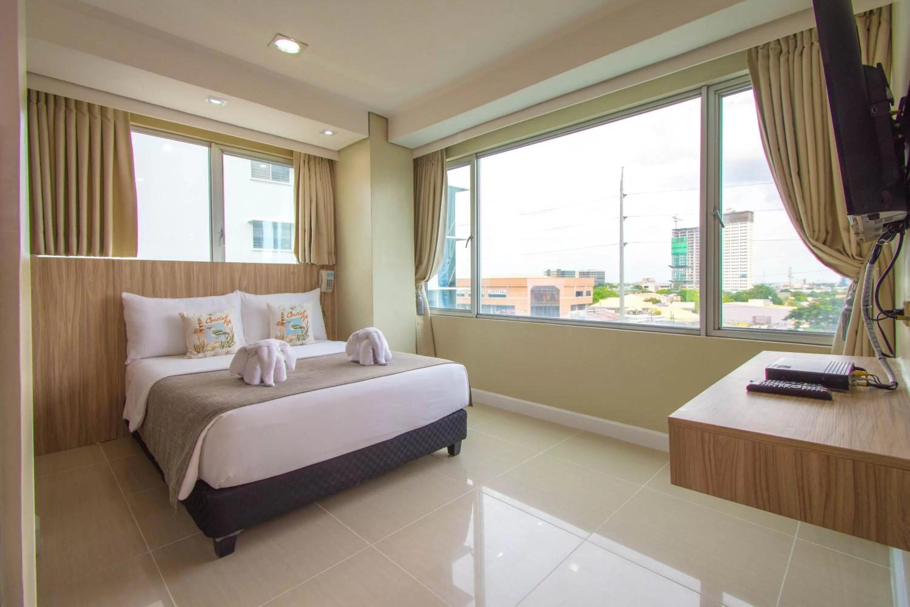 Bed in Alicia Apartelle