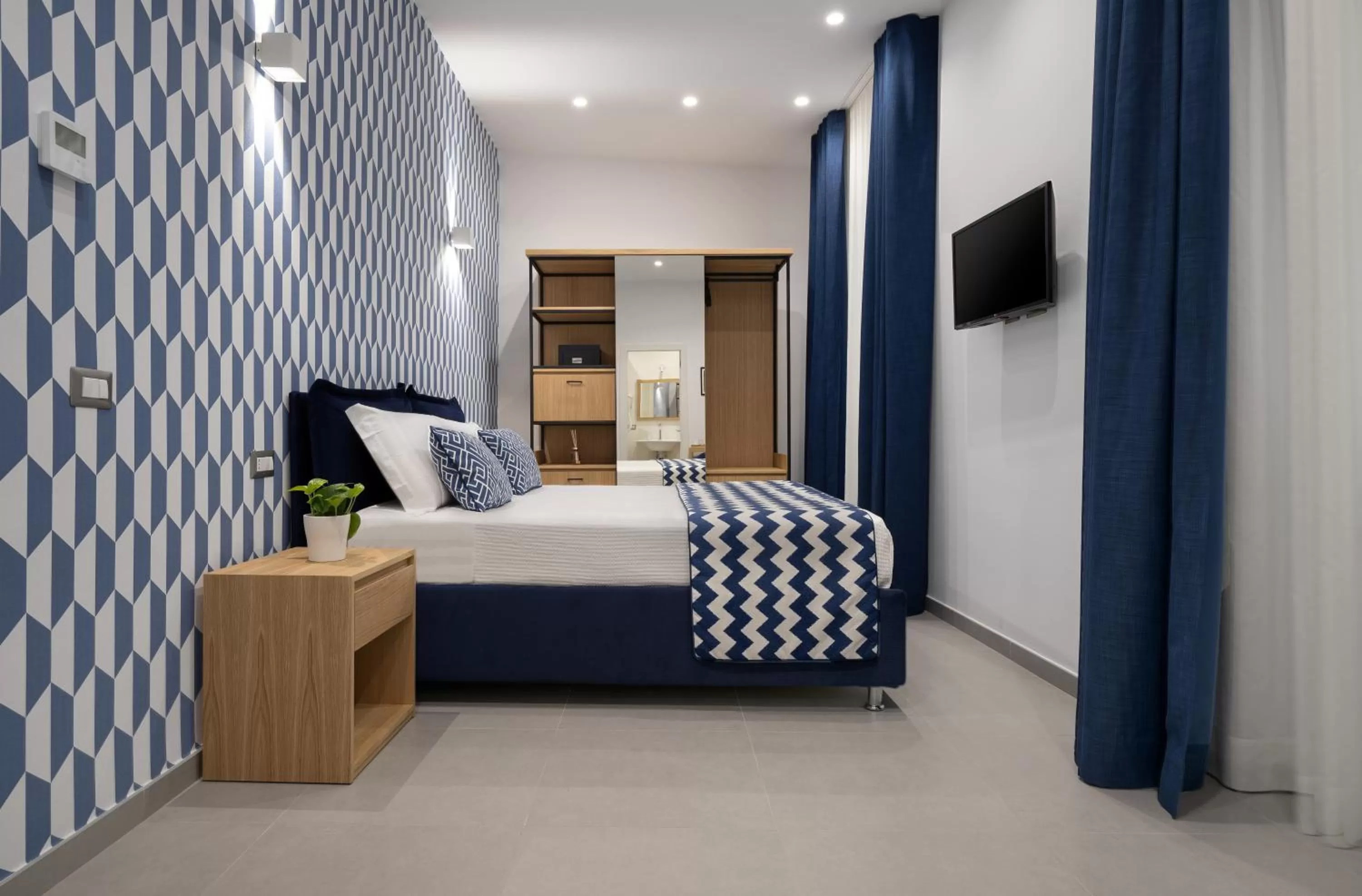 Bed in HSuites Luxury B&B