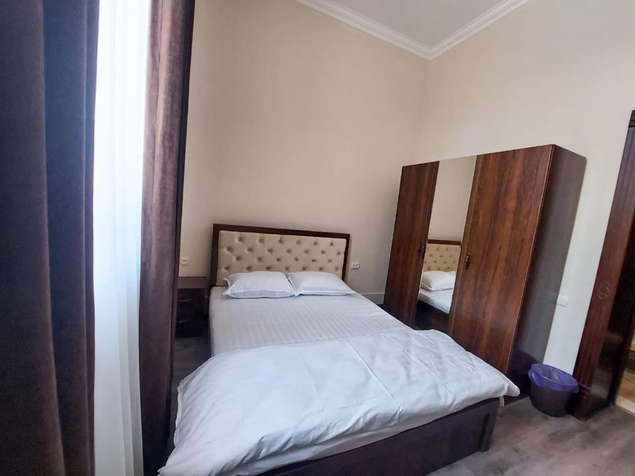 Photo of the whole room, Bed in Samarabonu Hotel