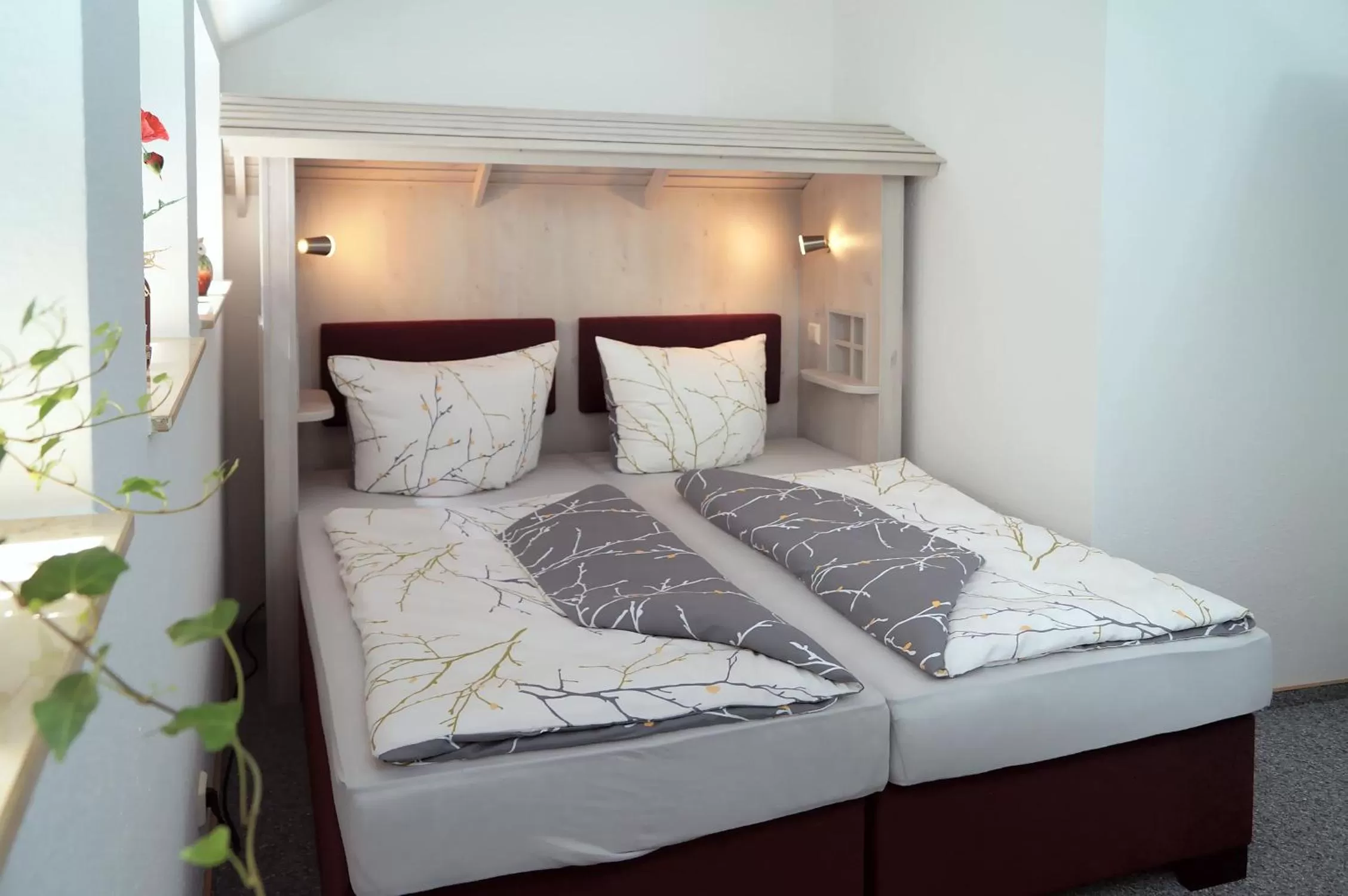 Bed in Erzgebirgshotel Misnia Bärenfels