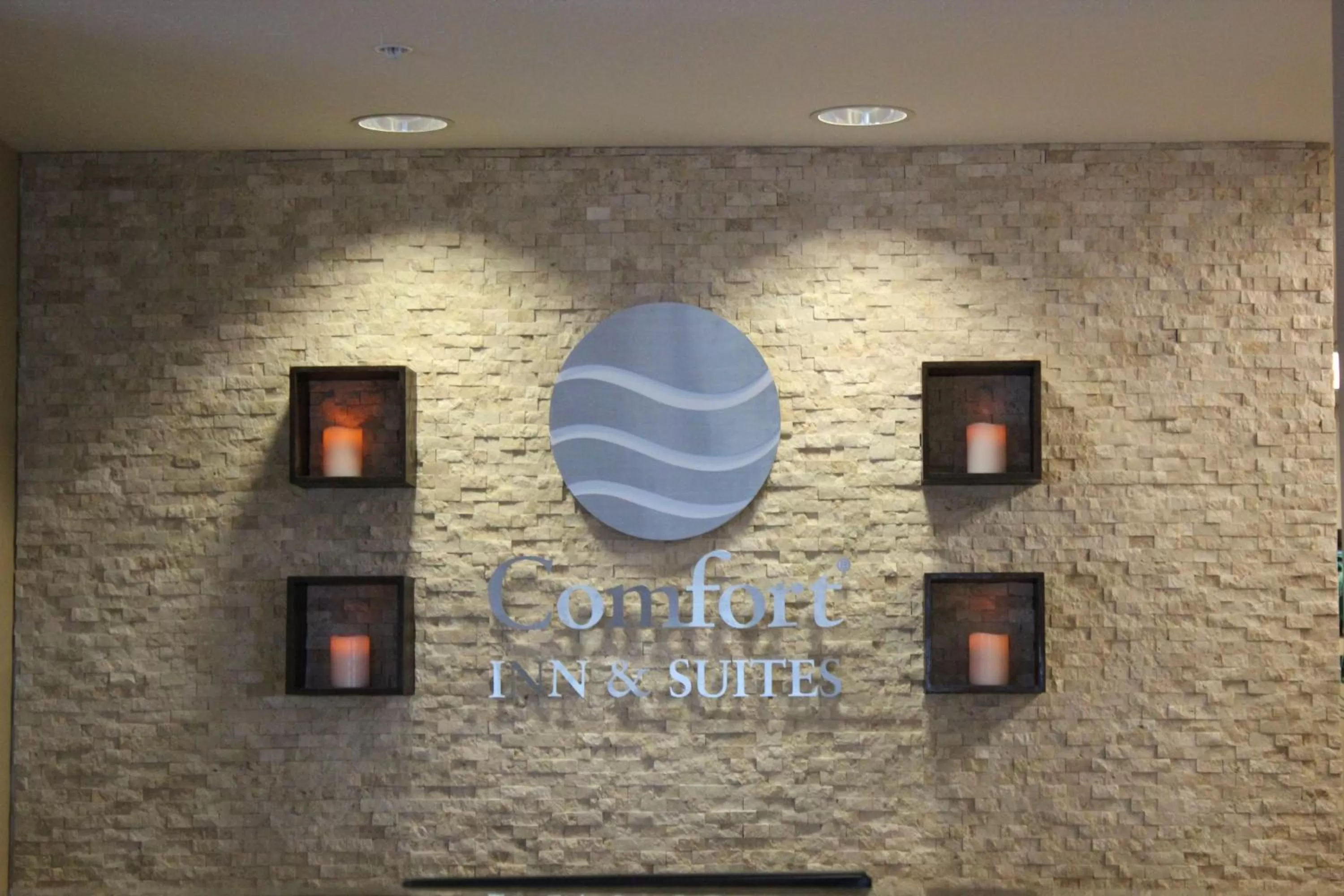 Property logo or sign in Comfort Inn & Suites Edmonton International Airport
