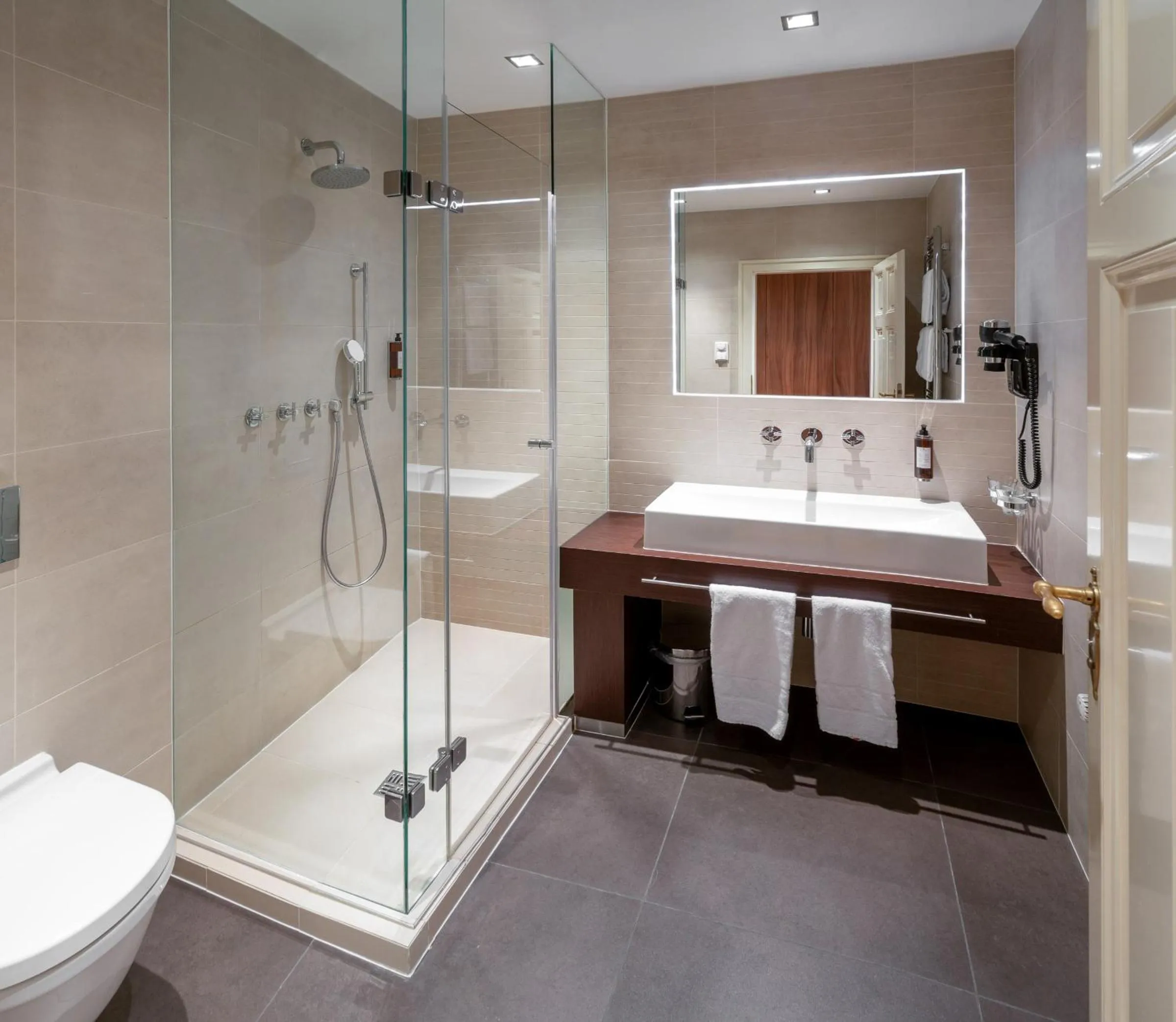 Bathroom in Golden Angel Suites by Adrez