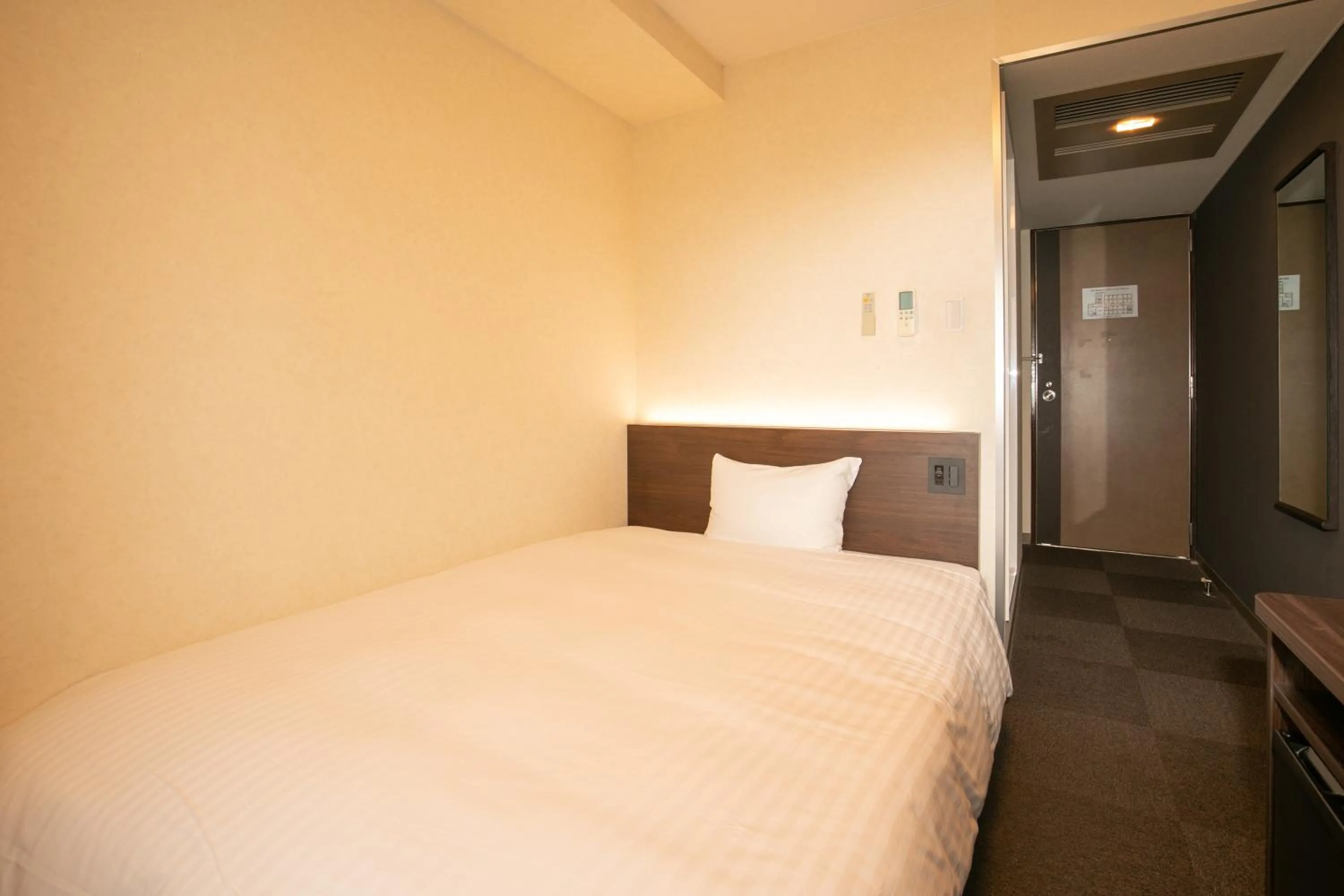 Bed in Kochi Sunrise Hotel