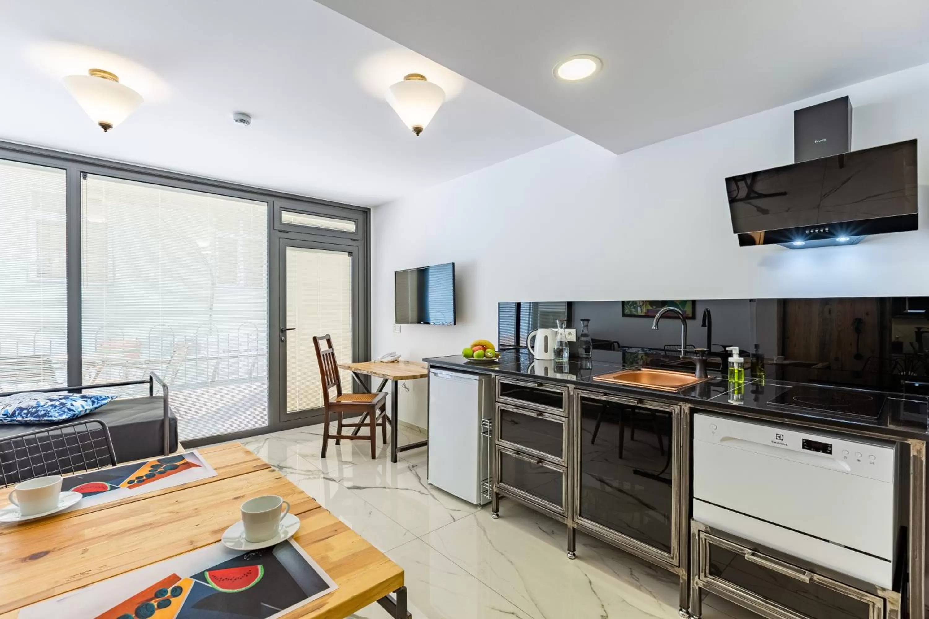 Kitchen or kitchenette in Villa Pera Suite Hotel