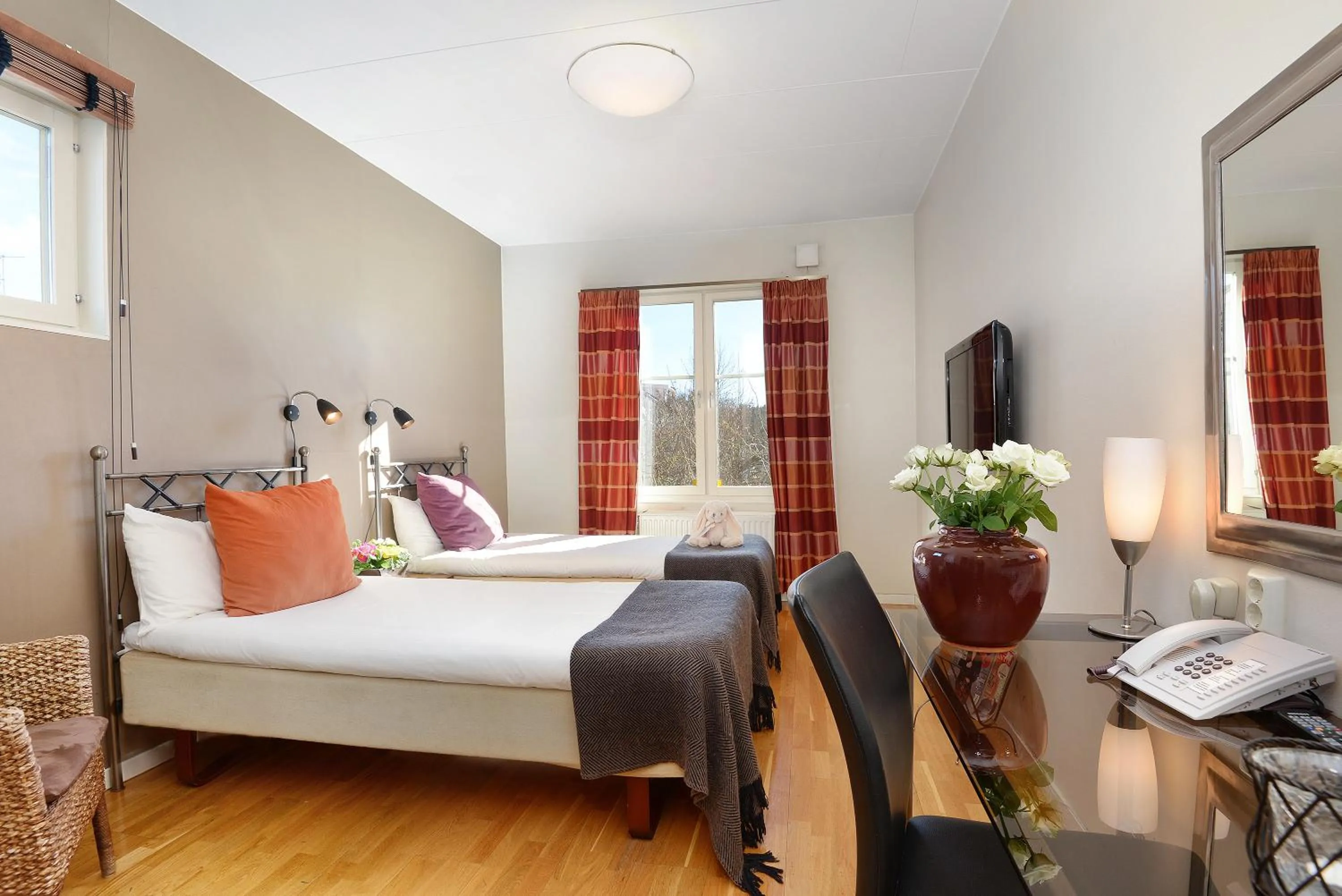 Bathroom, Bed in Maude´s Hotel Enskede Stockholm