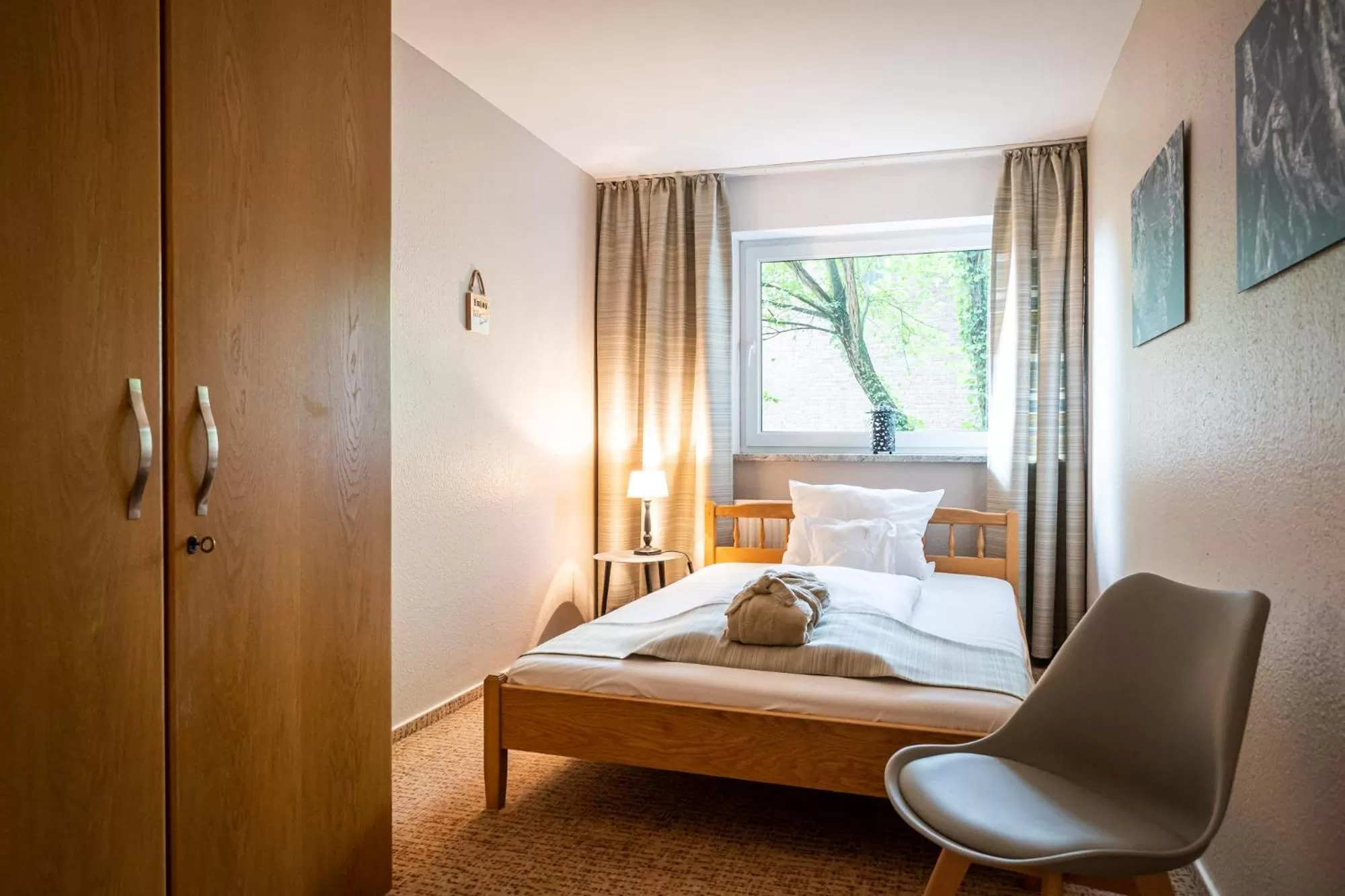 Bed in Waldhotel Tannenhäuschen