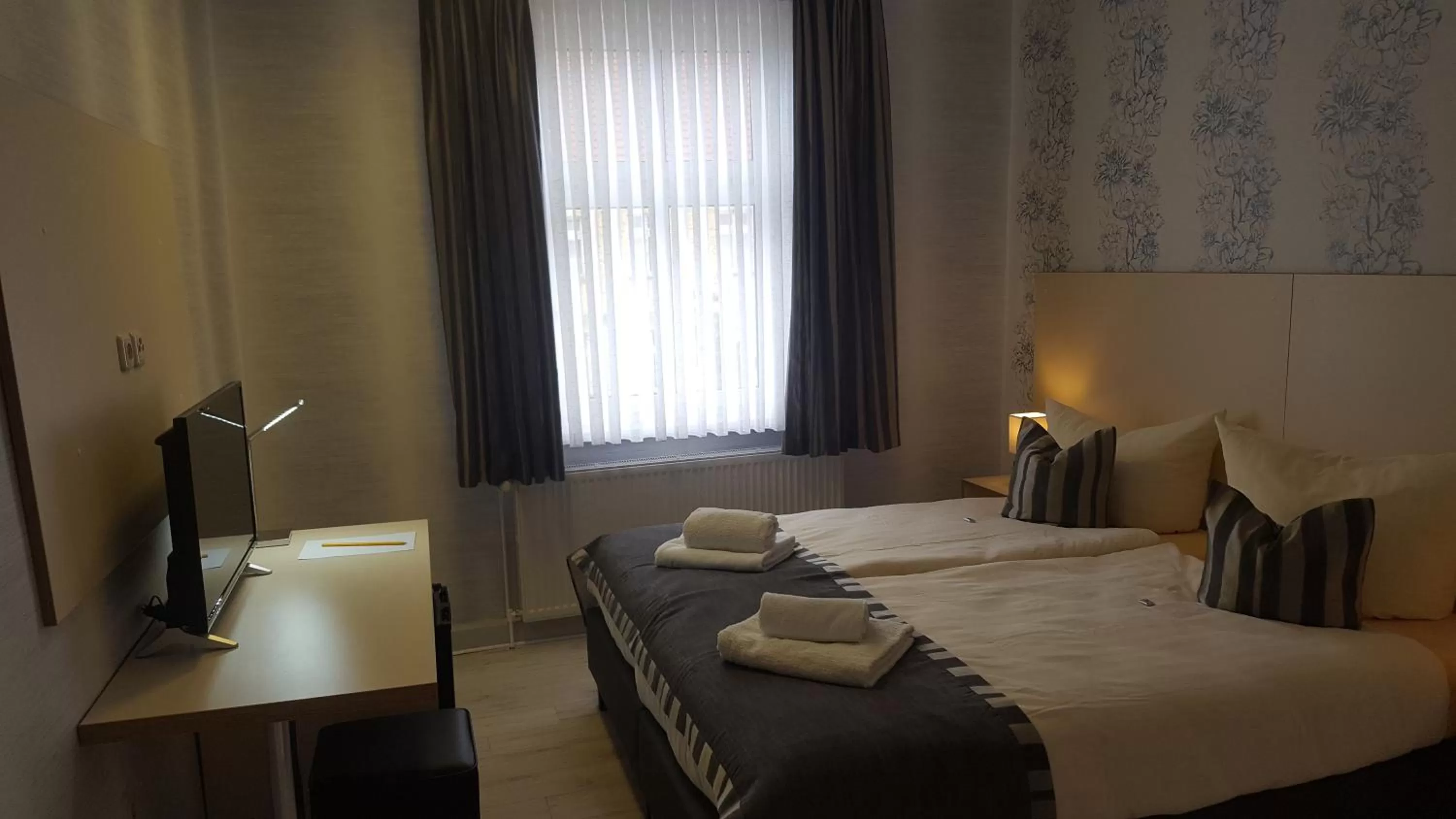 Photo of the whole room, Bed in Novel Hotel