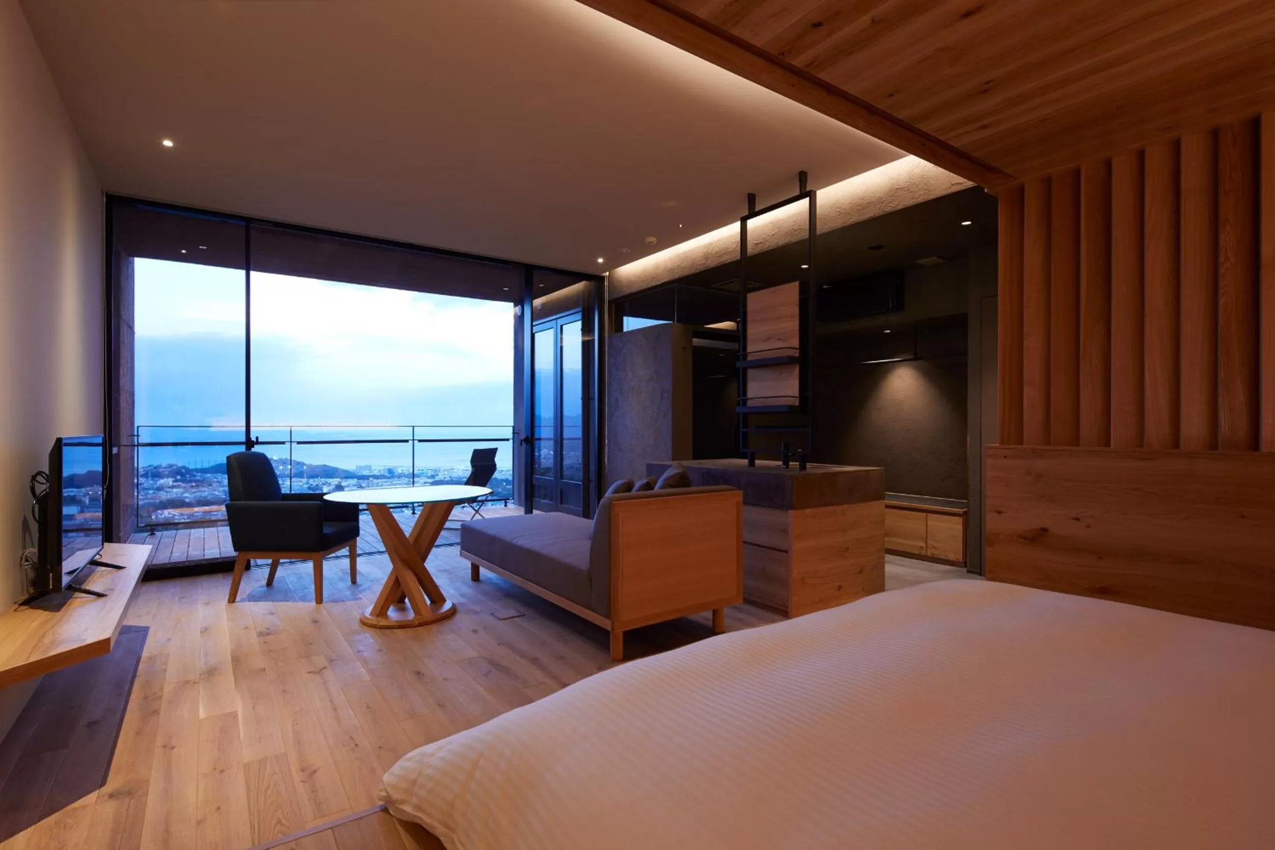 Seating area, Bed in SEKIYA RESORT Galleria Midobaru