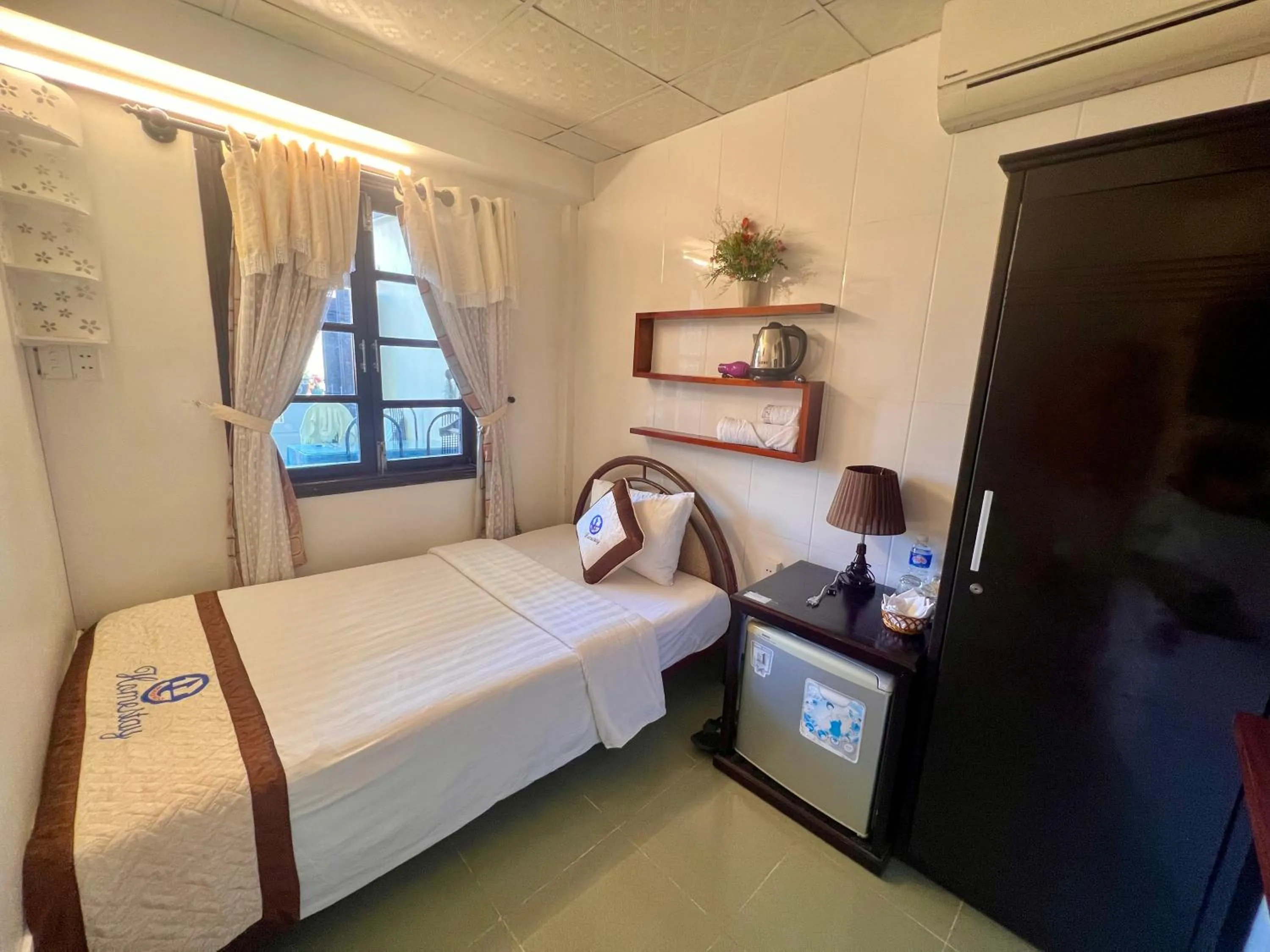 Photo of the whole room, Bed in Hoi An Ngo Homestay