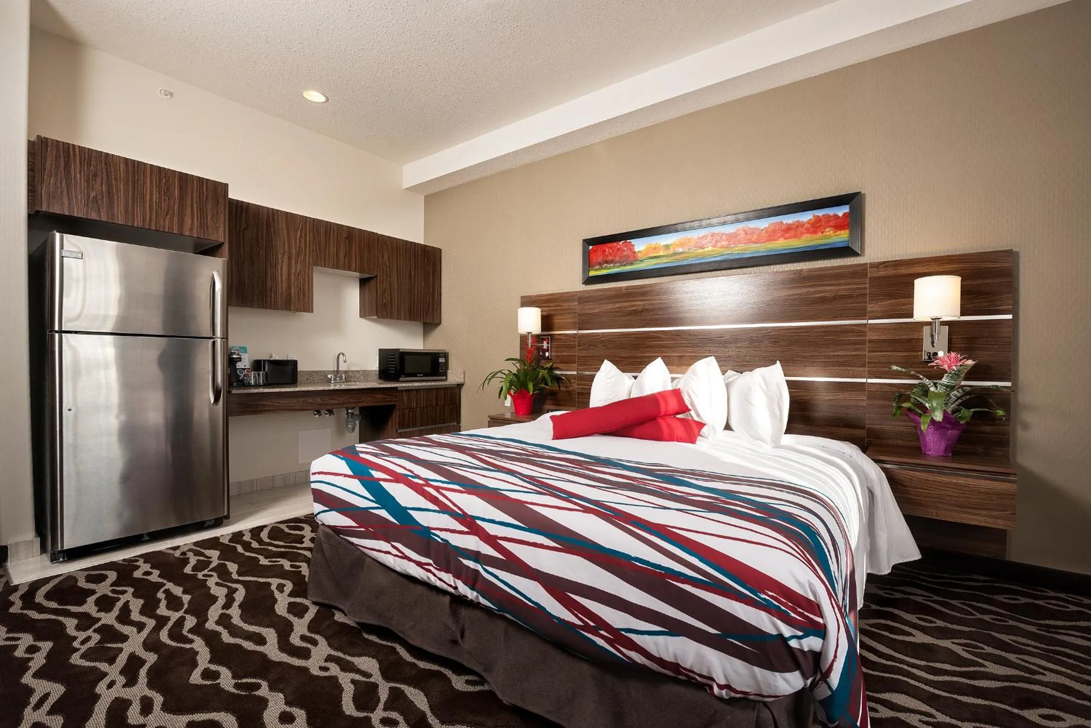 Bedroom, Bed in Encore Suites by Service Plus Inns