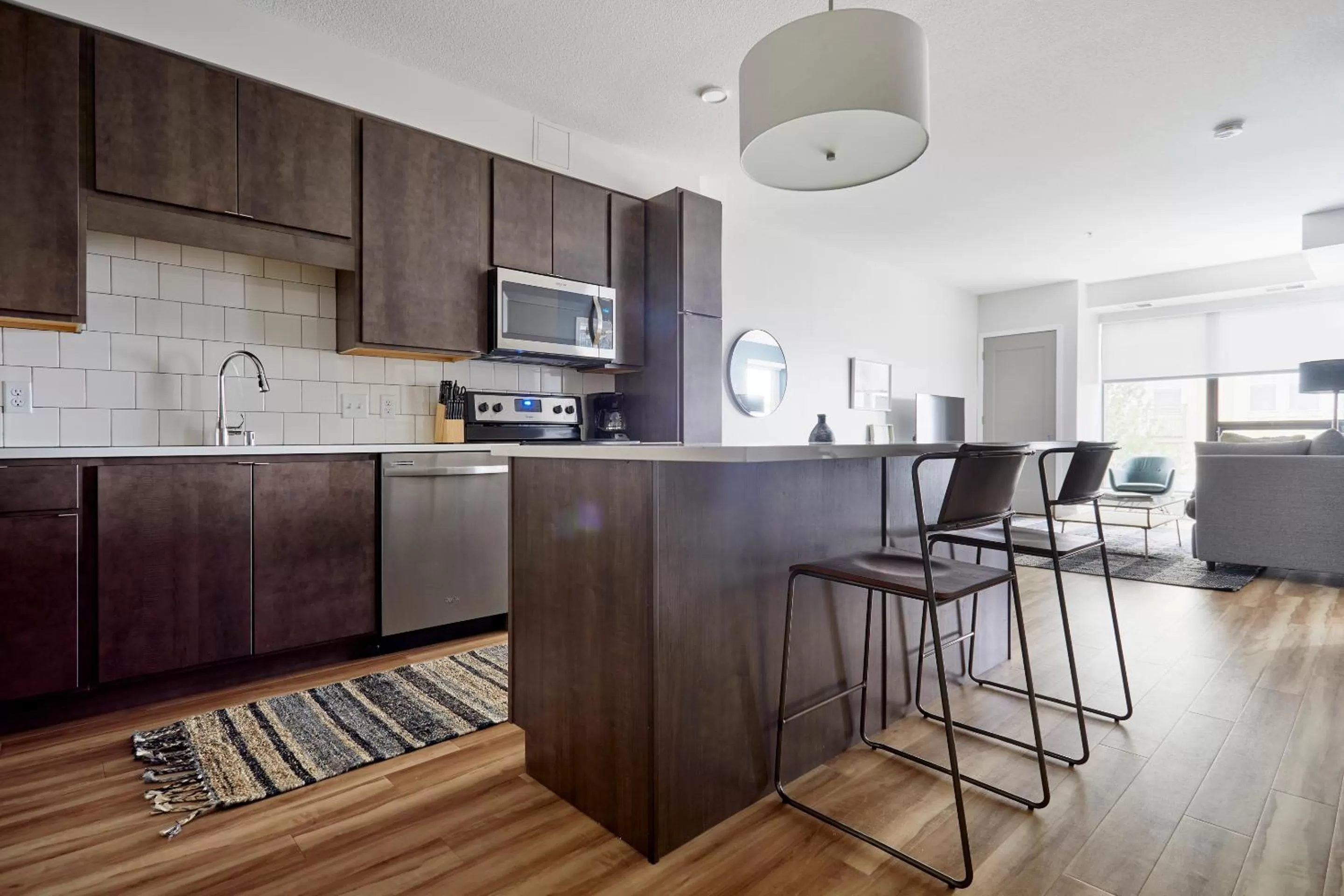 Living room, Kitchen/Kitchenette in Sonder at REVEL