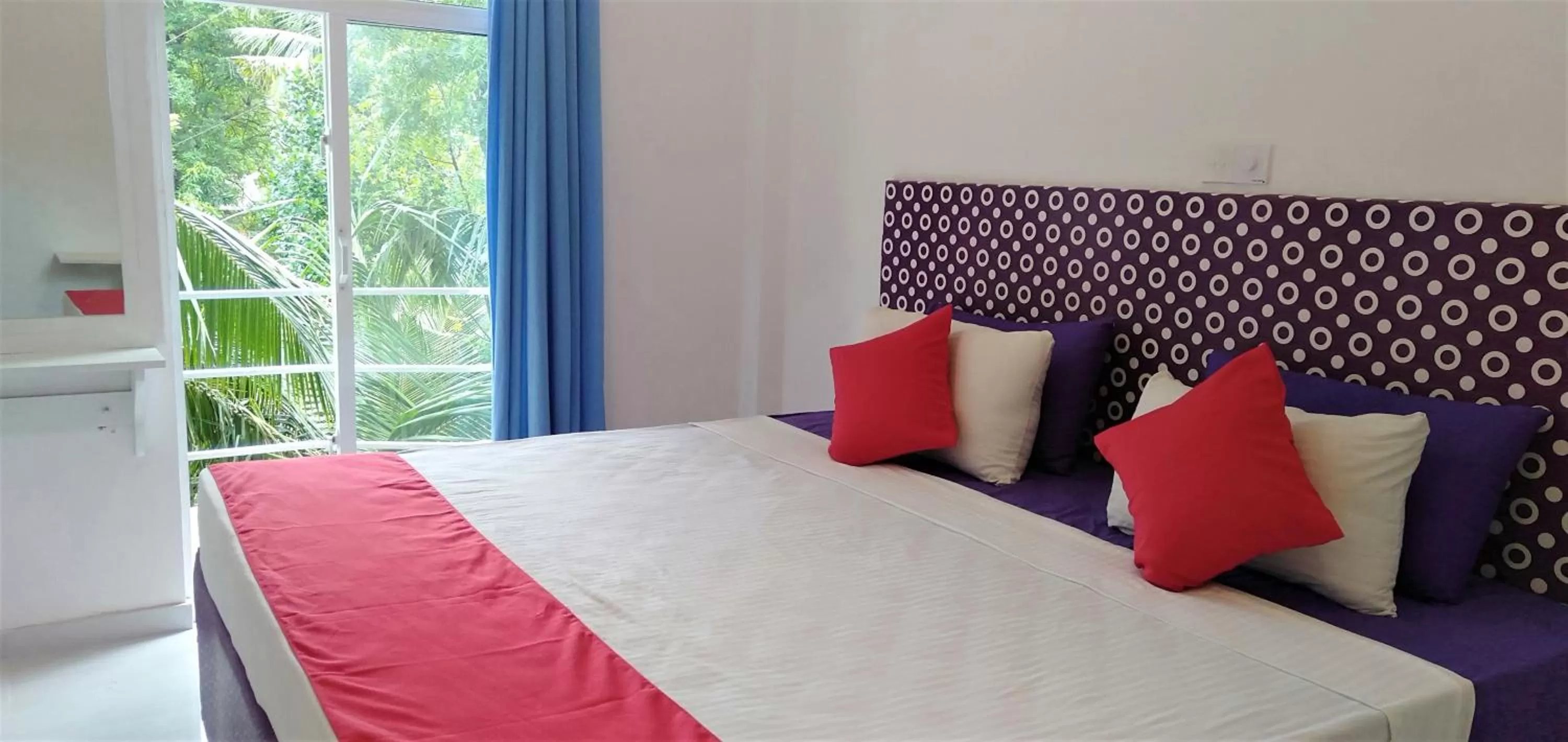 Bed in Ocean Bay Surf Resort Weligama