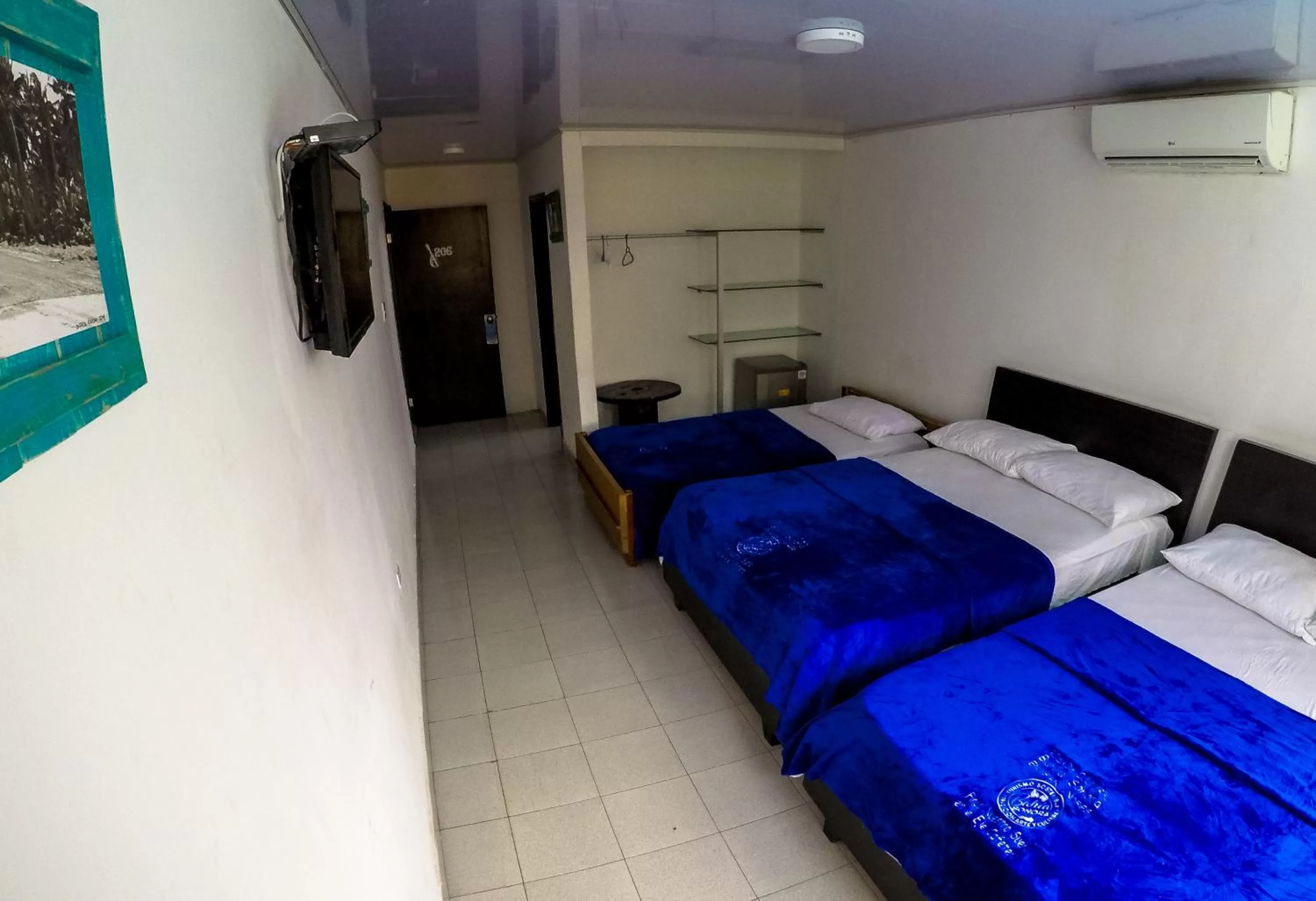 Bed in Posada Cultural Bahia Sonora