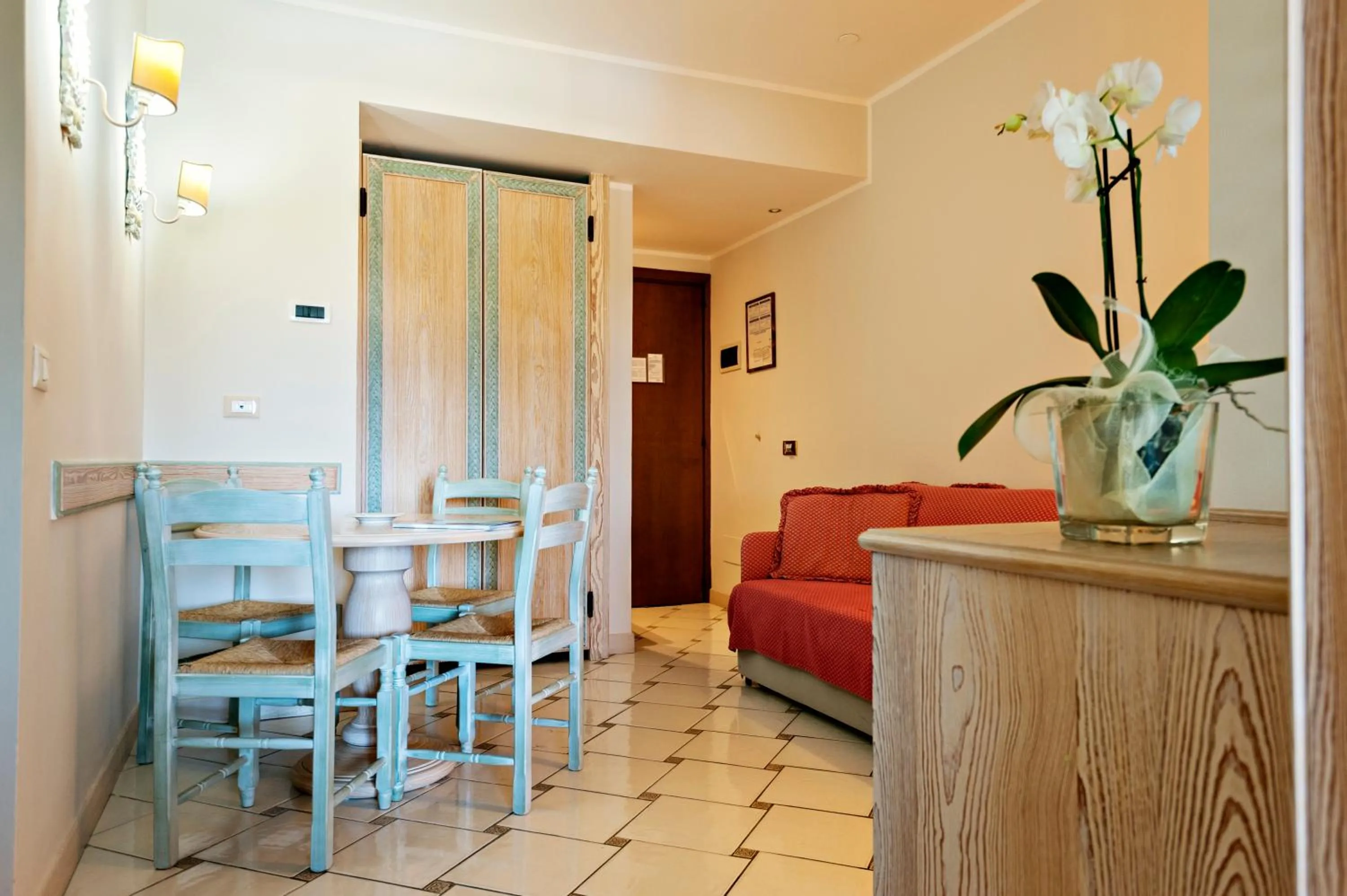 Living room, Bed in Golf Hotel Punta Ala