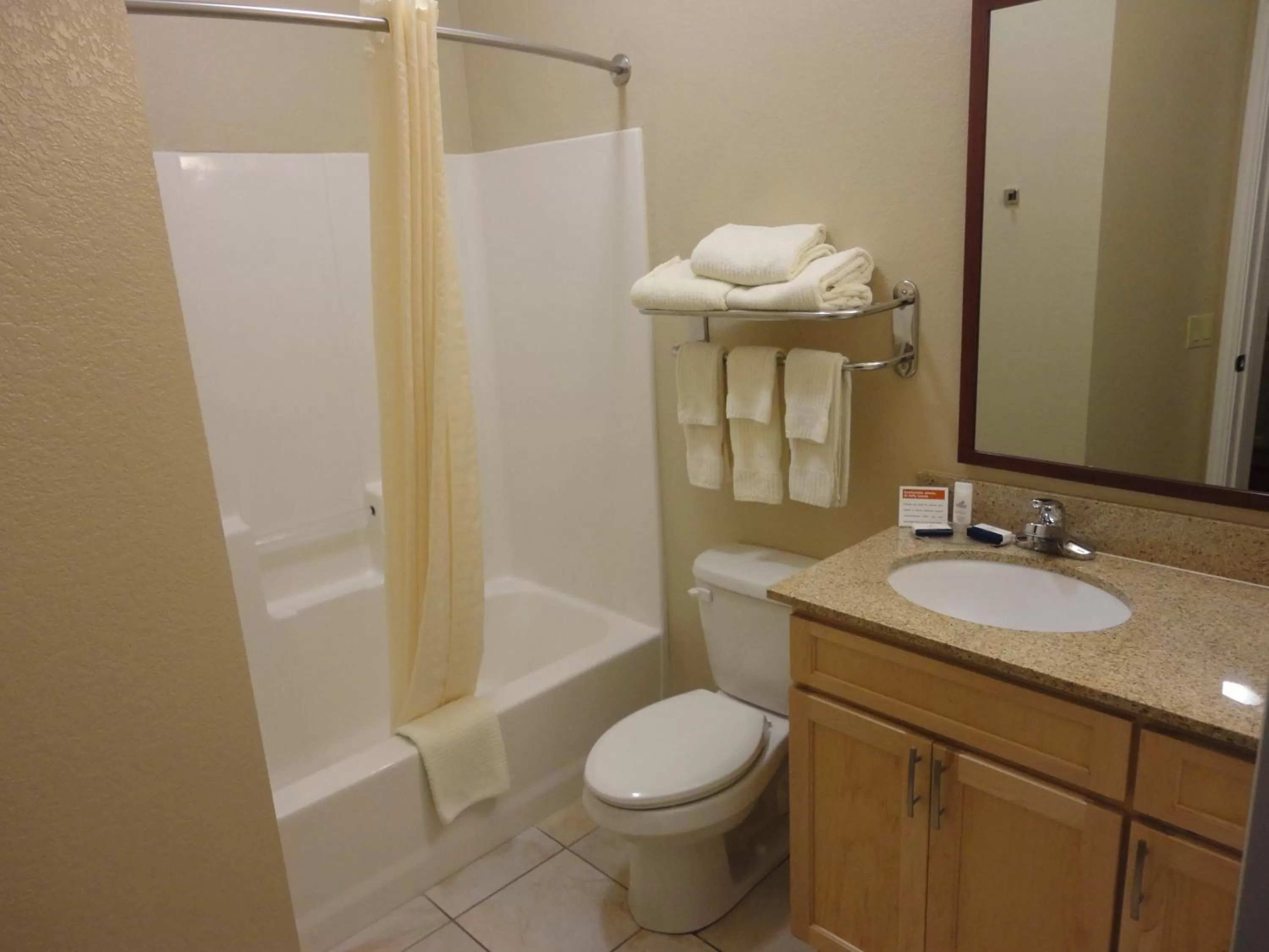 Bathroom in Candlewood Suites Houston The Woodlands by IHG