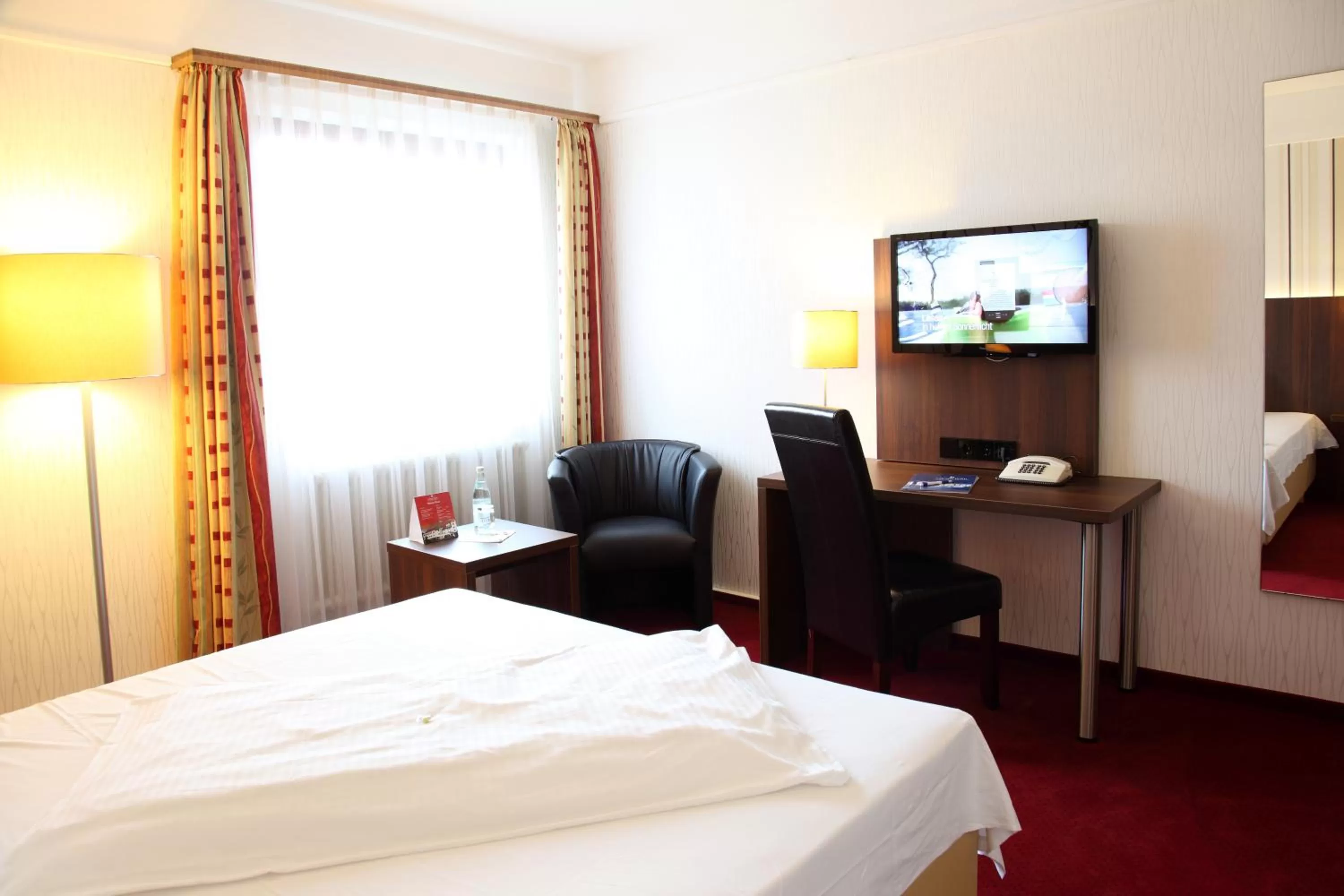 Photo of the whole room, Bed in Lobinger Hotel Weisses Ross