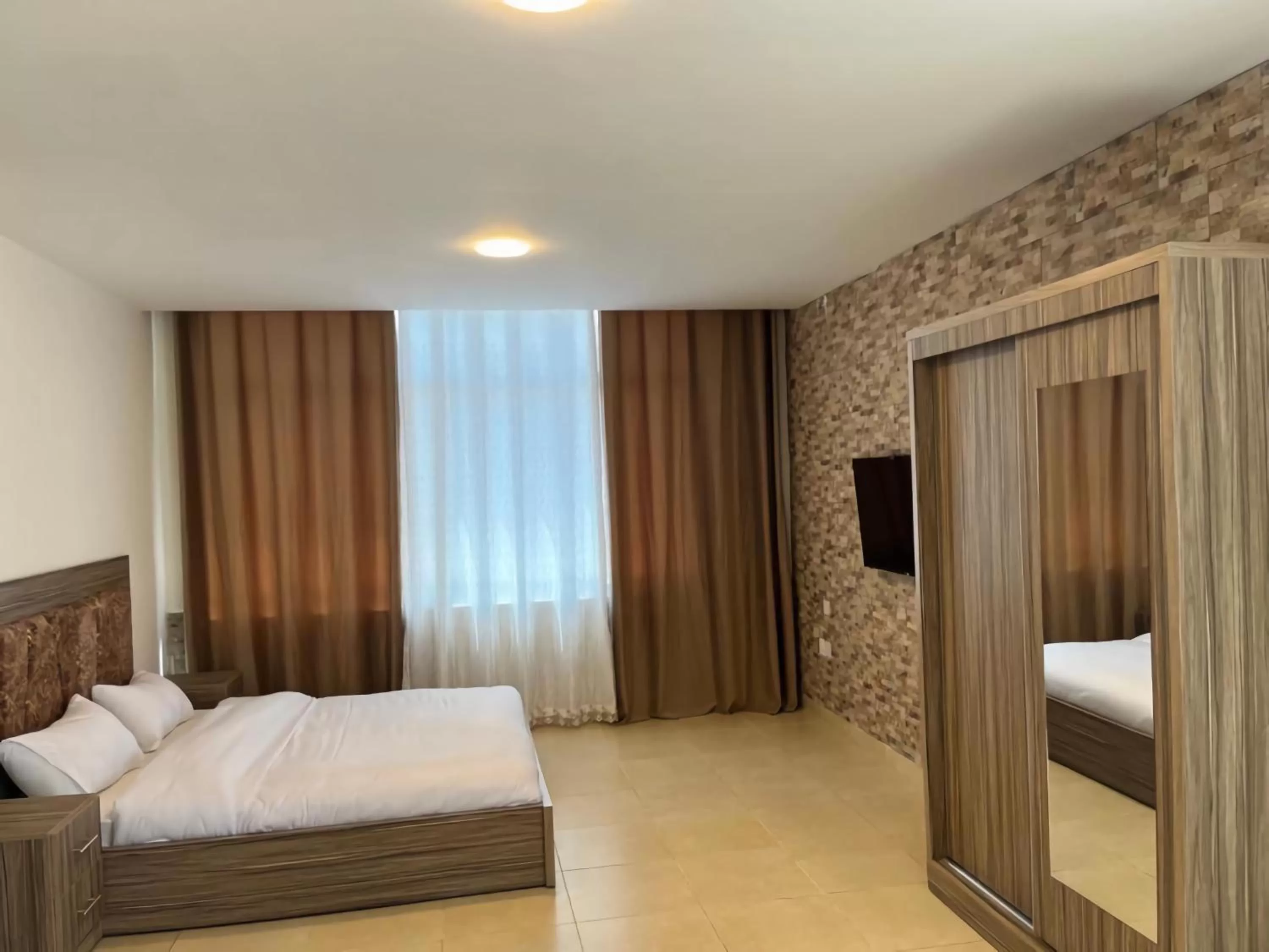 Photo of the whole room, Bed in Rayan Hotel Suites