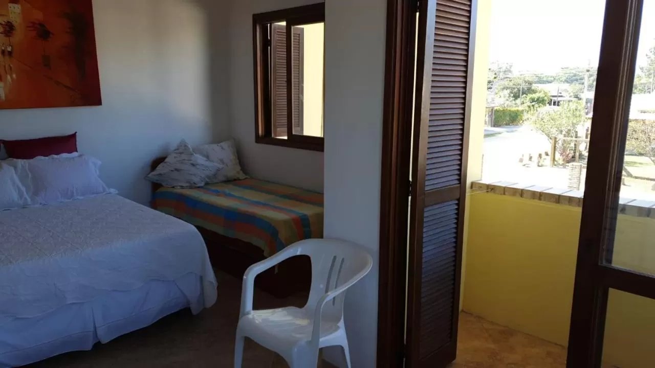 Bed in Pousada Itapuã RS