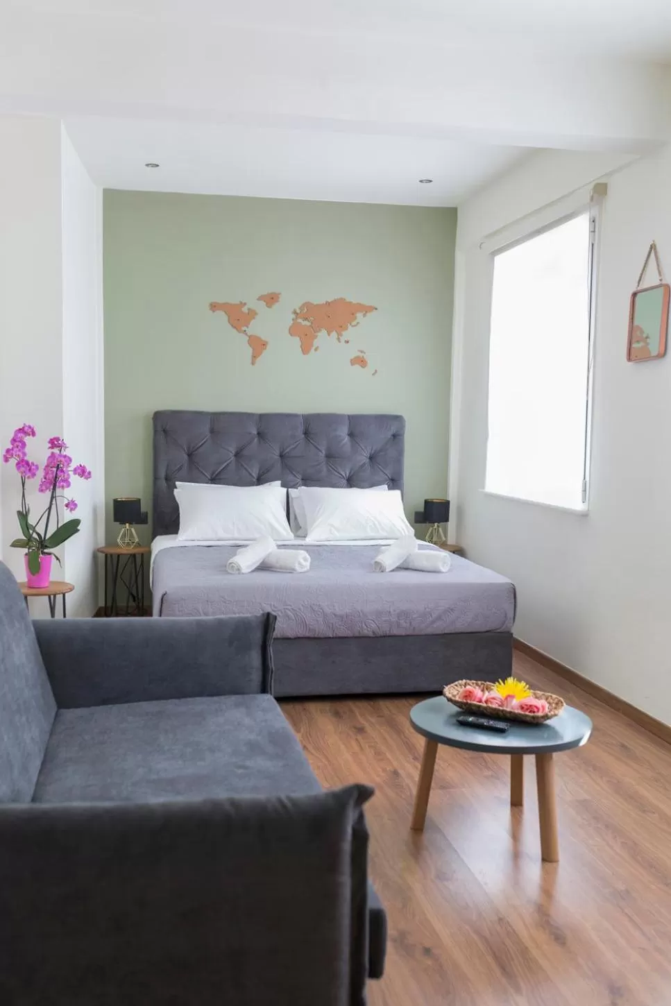 Seating area, Bed in The Athens Version Luxury Suites