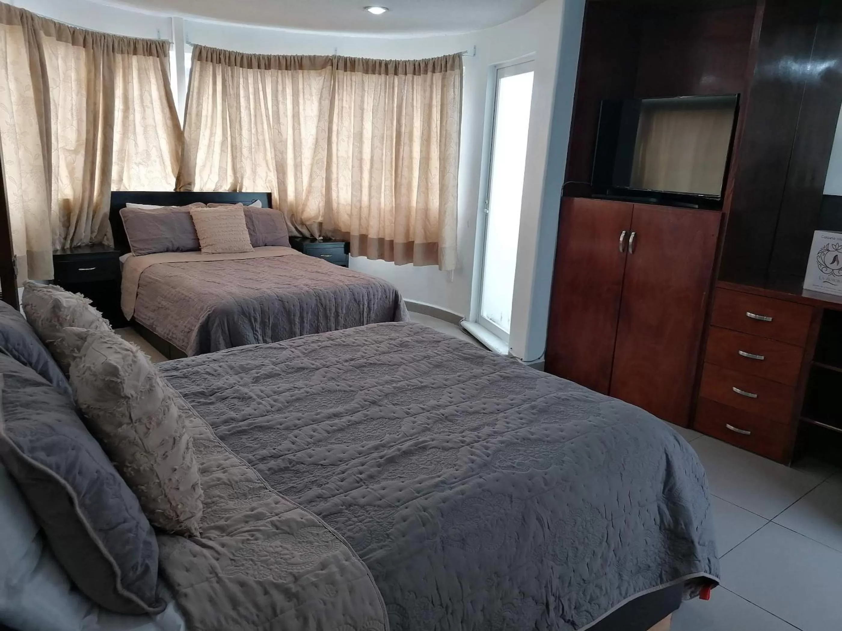 Photo of the whole room, Bed in La Aurora Hotel Like Home