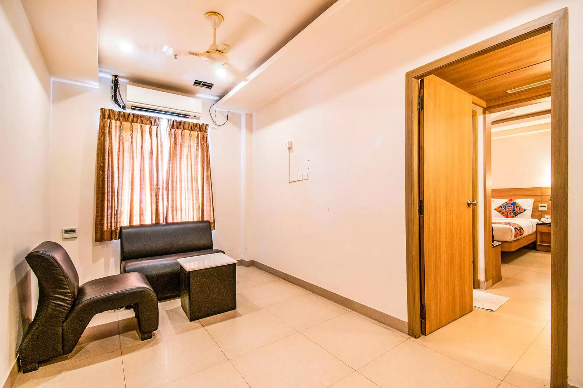 Bedroom, Seating Area in FabHotel Prime Royal Castle Gandhipuram