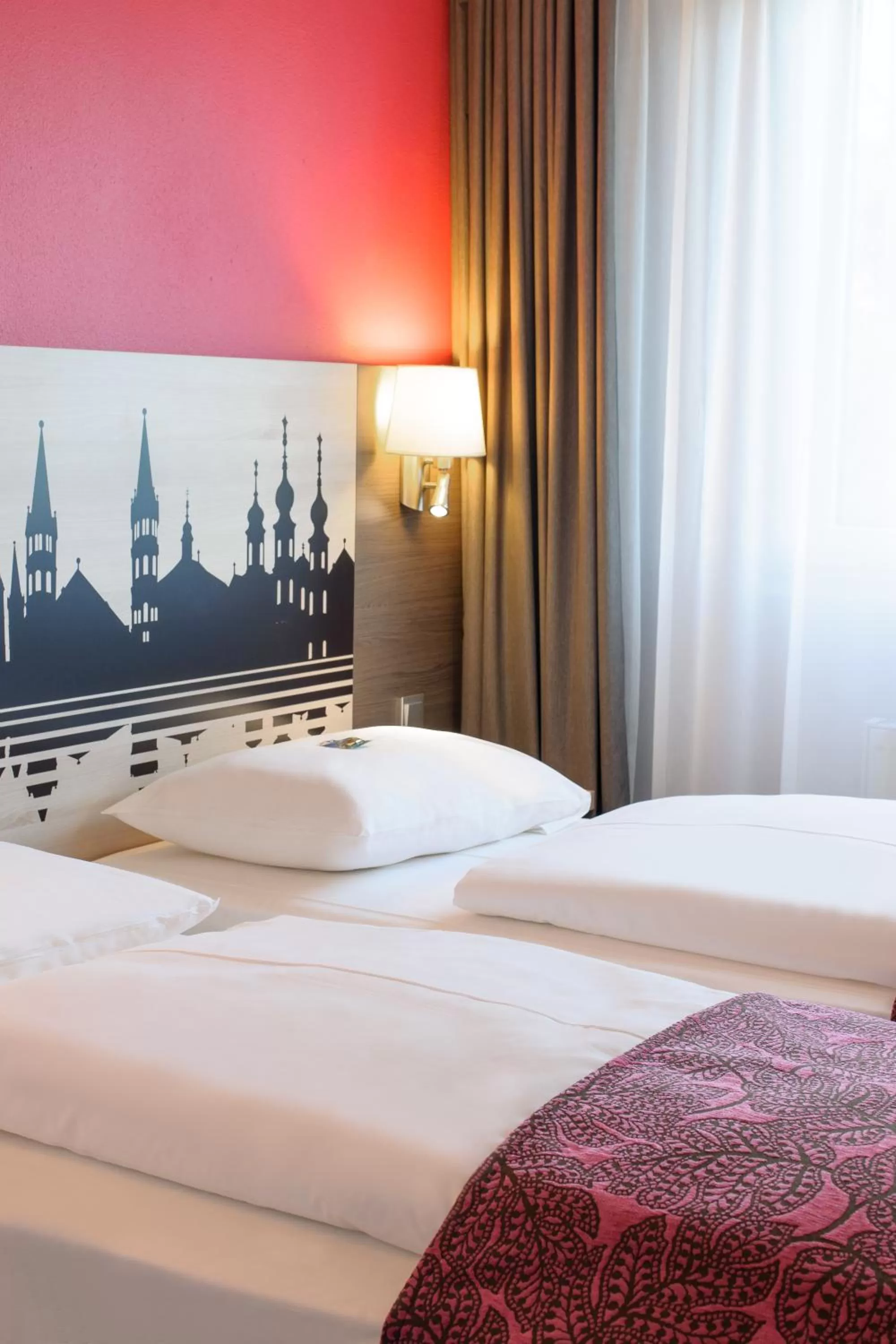 Bed in Mercure Hotel Würzburg am Mainufer