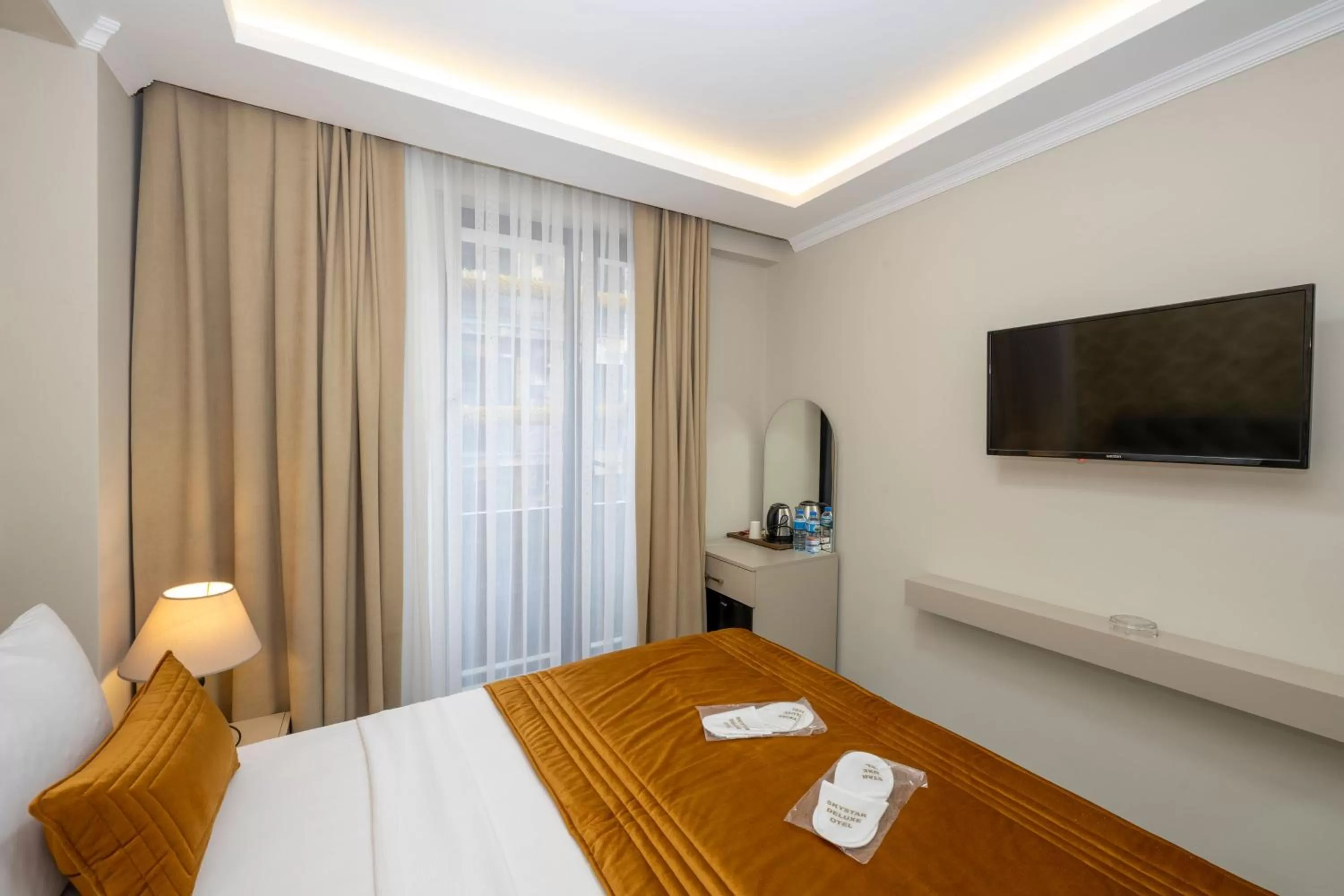 Bed in SKYSTAR DELUXE HOTEL