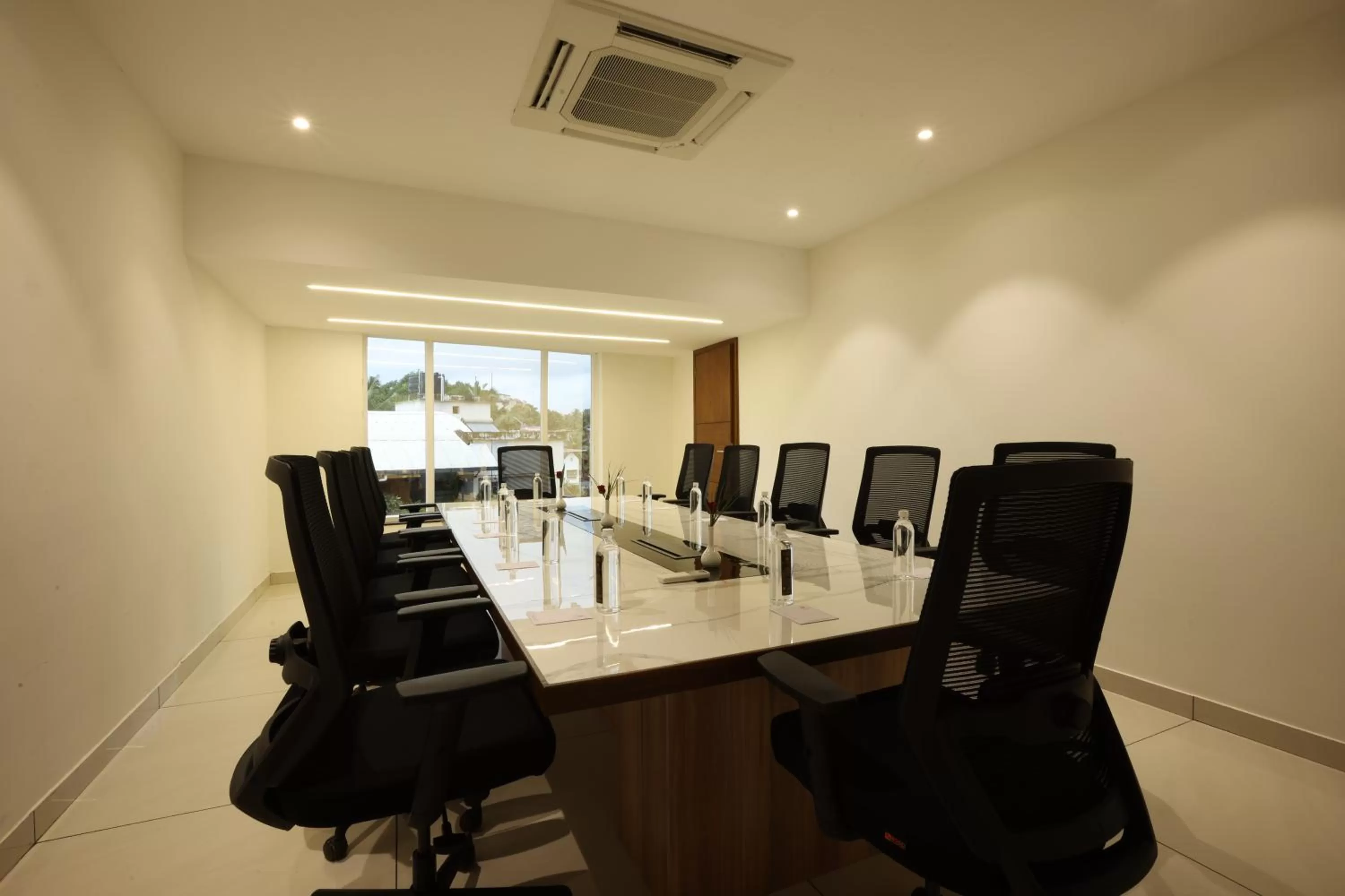 Meeting/conference room in Royal Plaza Suites by RAK Rooms, Mangaluru