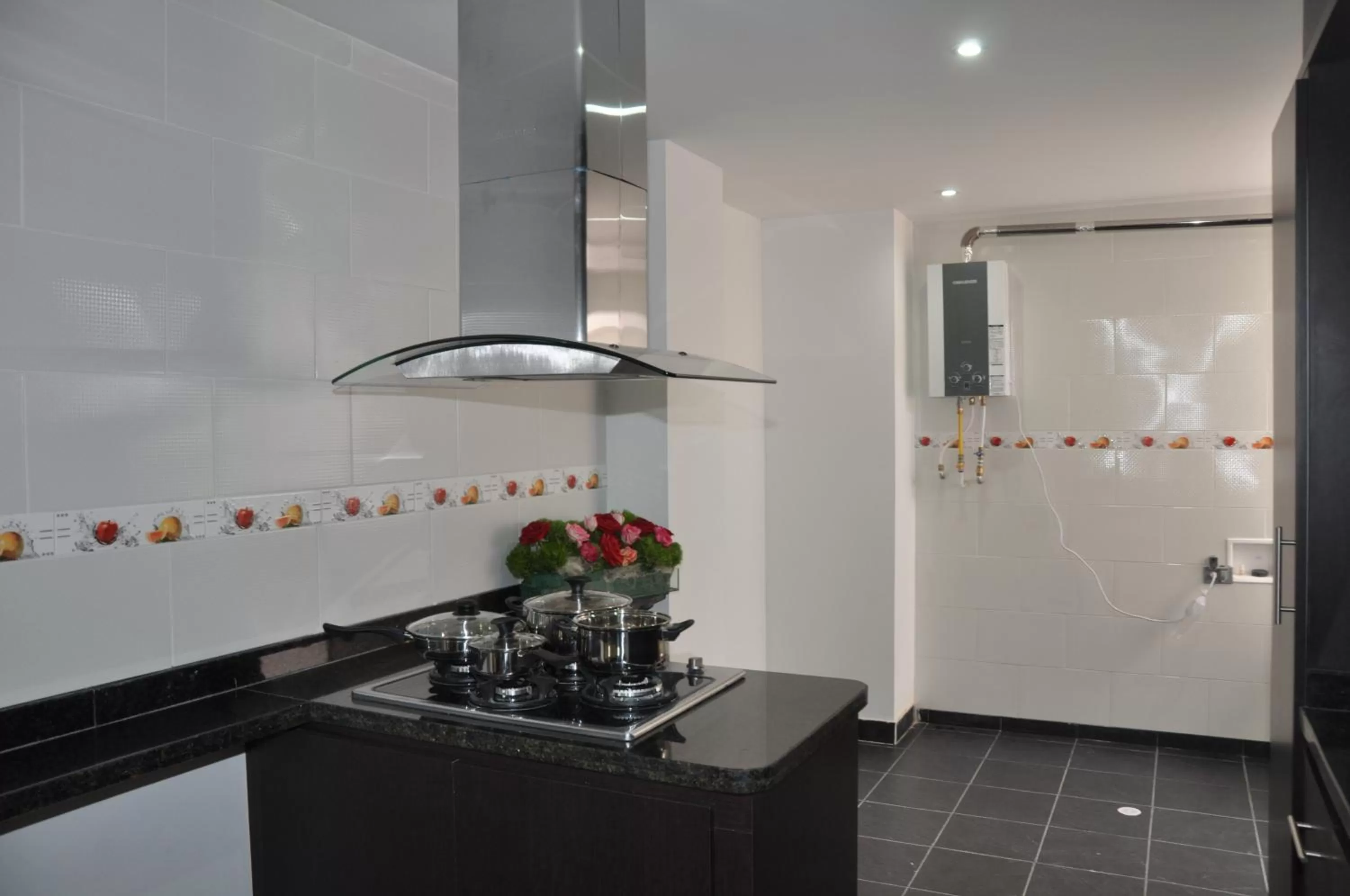 Kitchen or kitchenette in Apartamentos Plaza Modelia