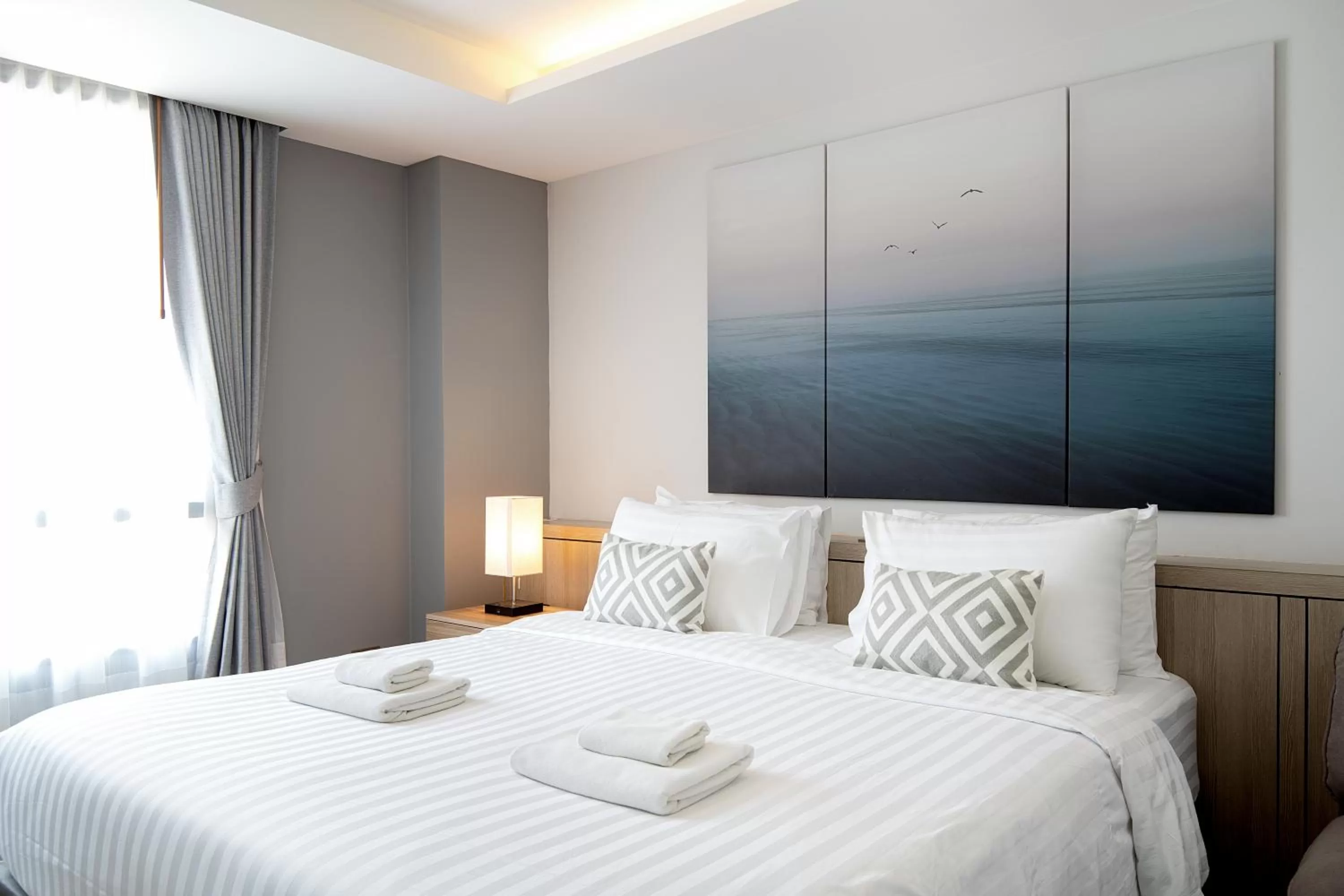 Bed in The Riski Hotel at Bangphlat Station SHA