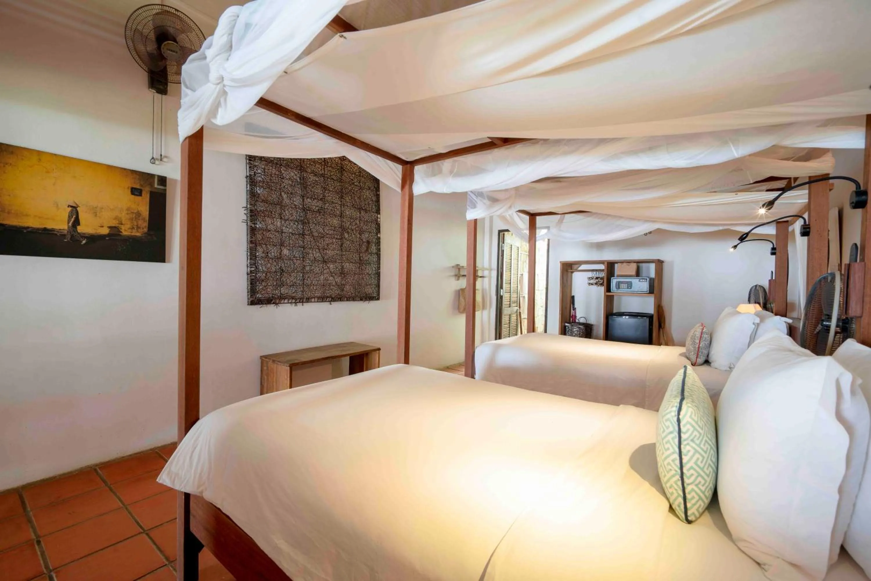 Bed in Mango Bay Resort