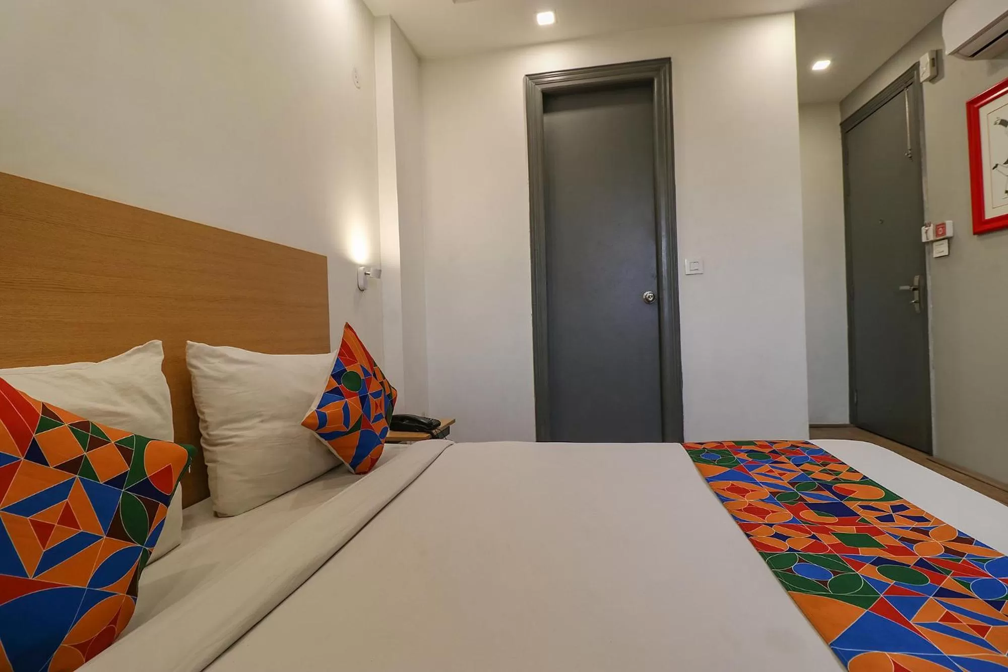Bedroom, Bed in FabHotel The Chaitanyas Rohini sec 18