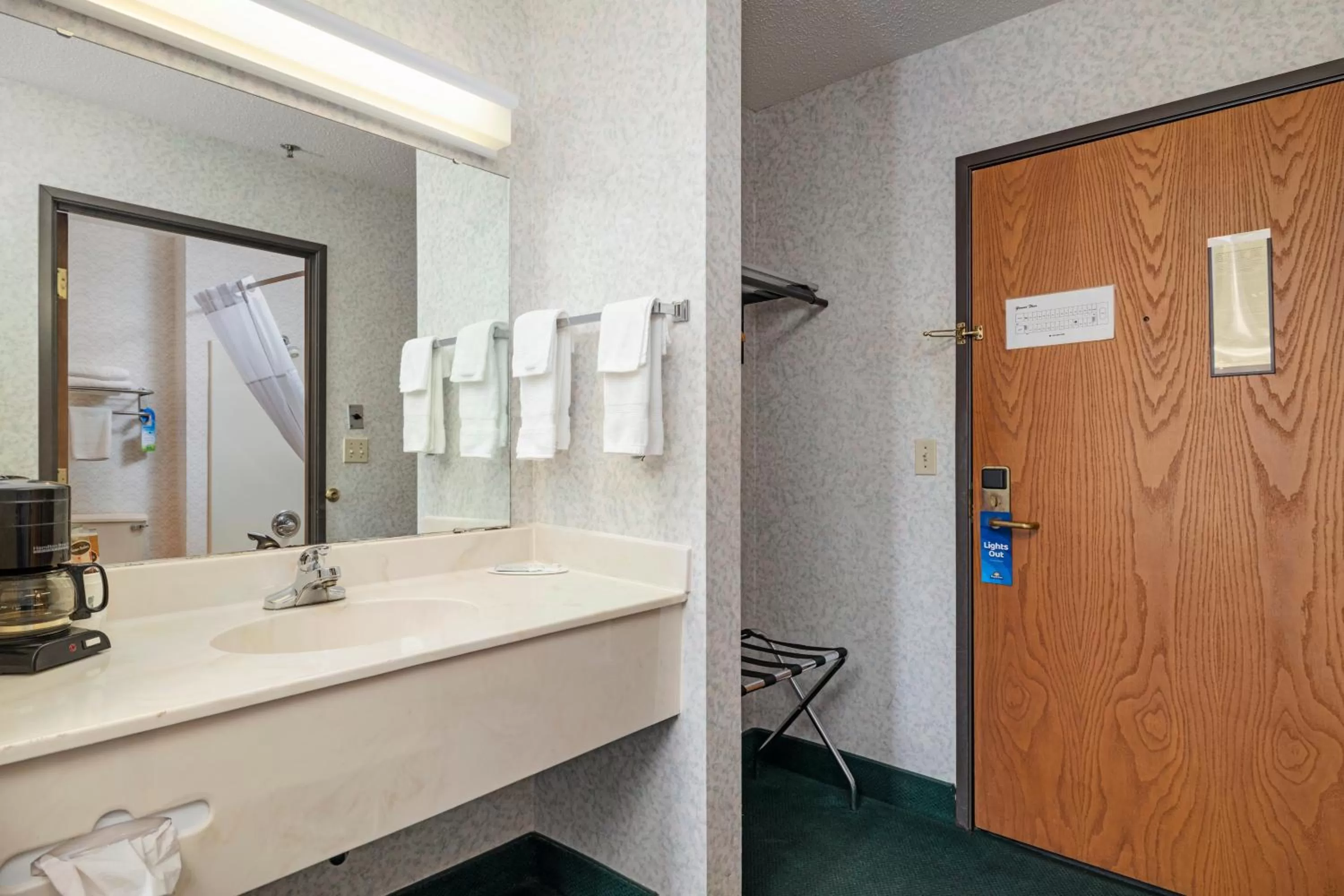 Bathroom in Days Inn by Wyndham Battlefield Rd/Hwy 65