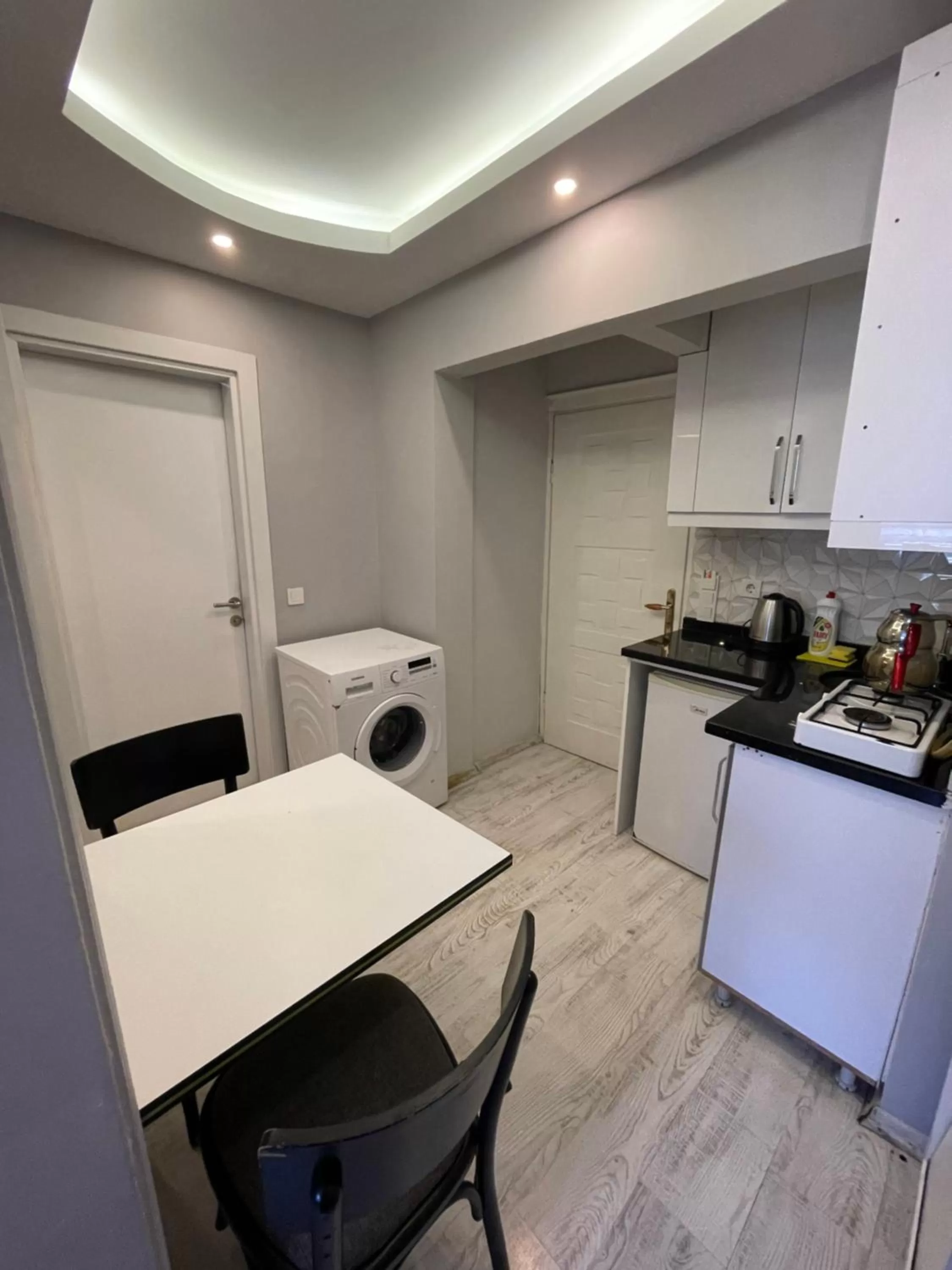 Kitchen or kitchenette in Arat Apartments