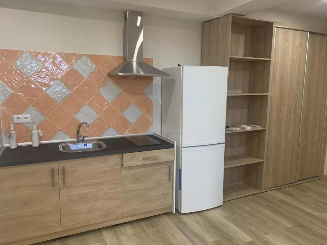 Kitchen/Kitchenette in HOTEL apartamentos SEVEN ROOMS