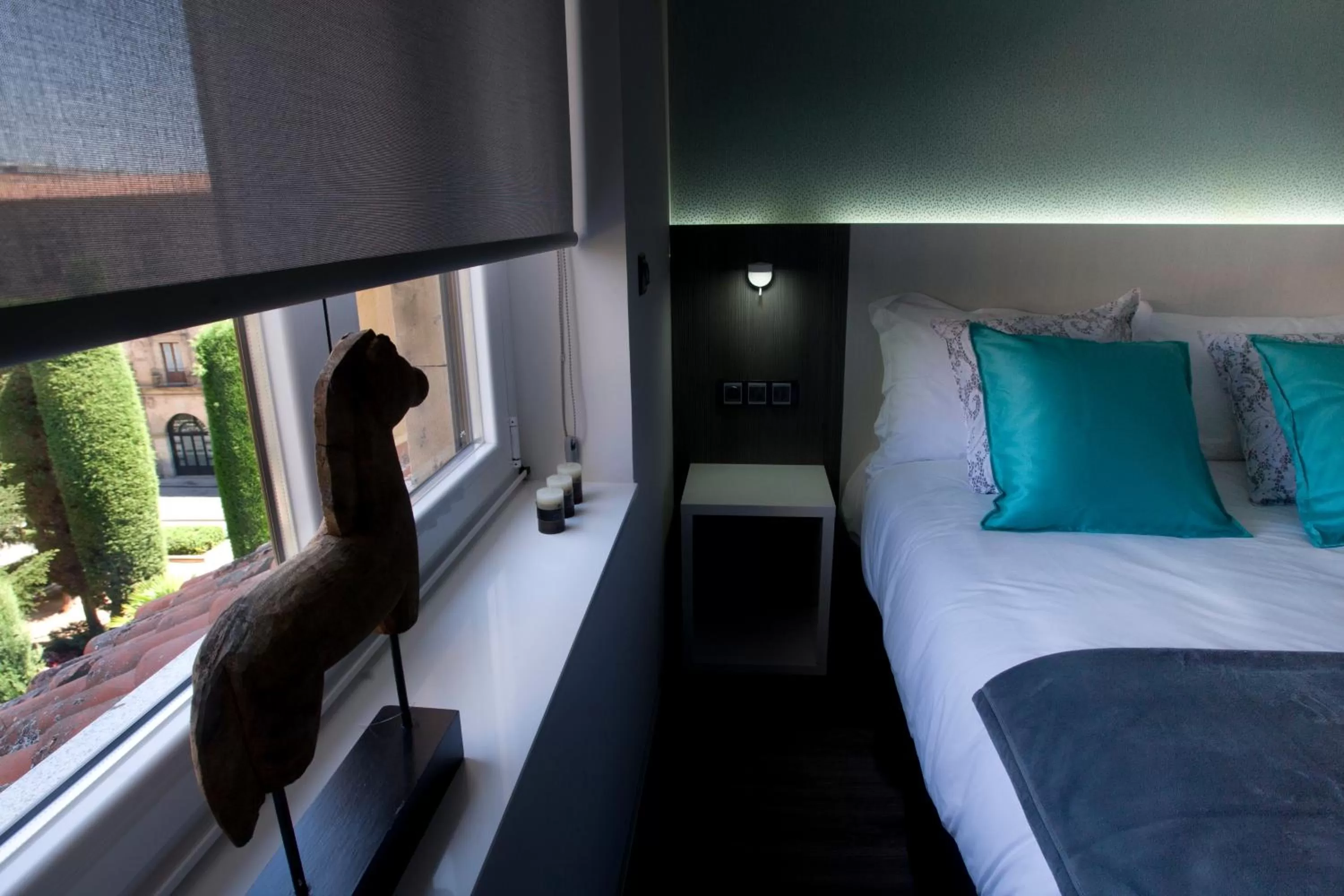 Decorative detail, Bed in Salamanca Suite Studios