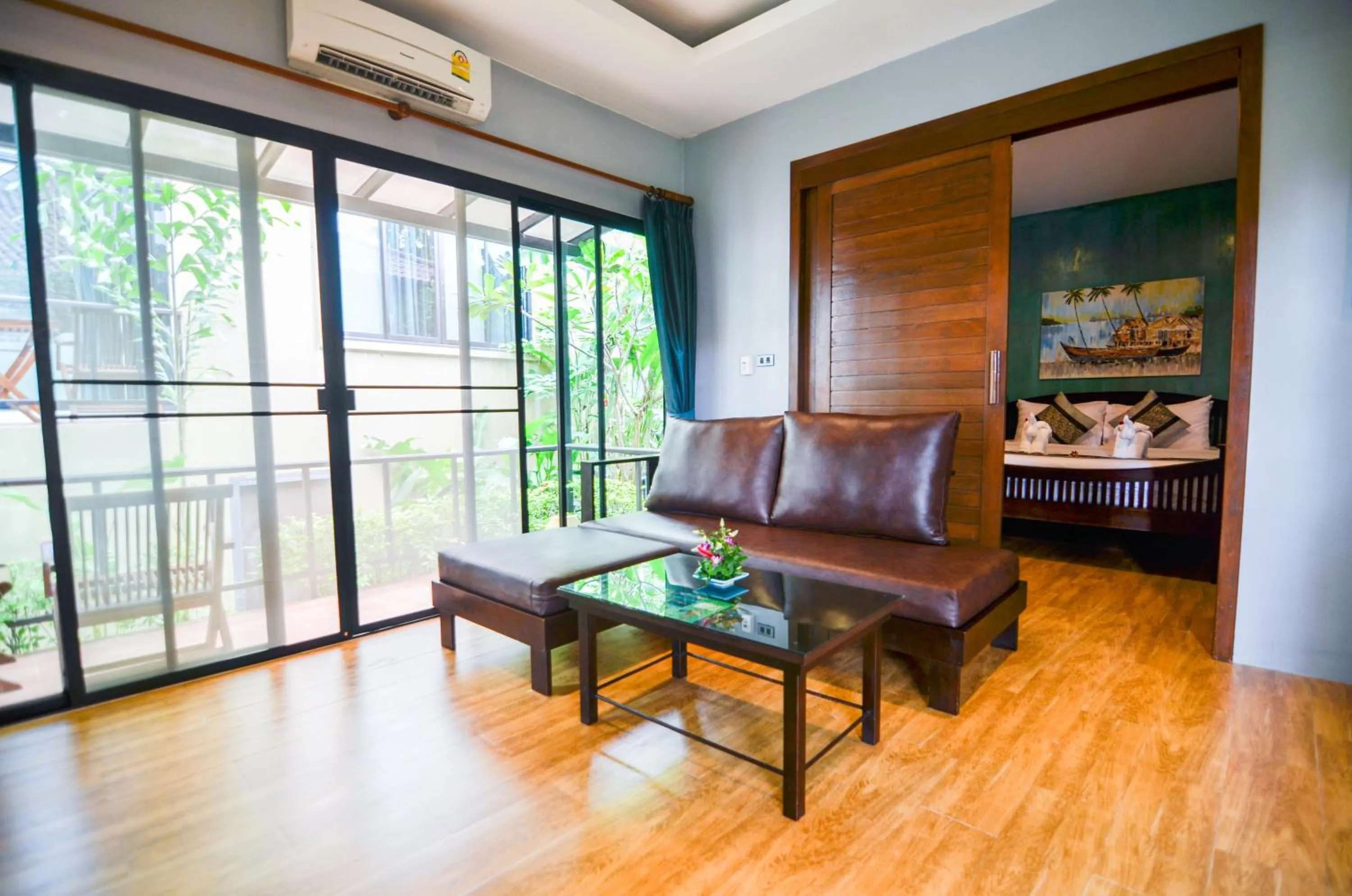 Living room in Cocoville Phuket - SHA Plus